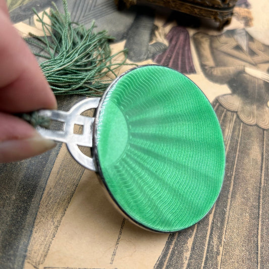 1931 Sterling silver guilloche enamel purse mirror in green sunburst with tassel - Splendid Vintage World