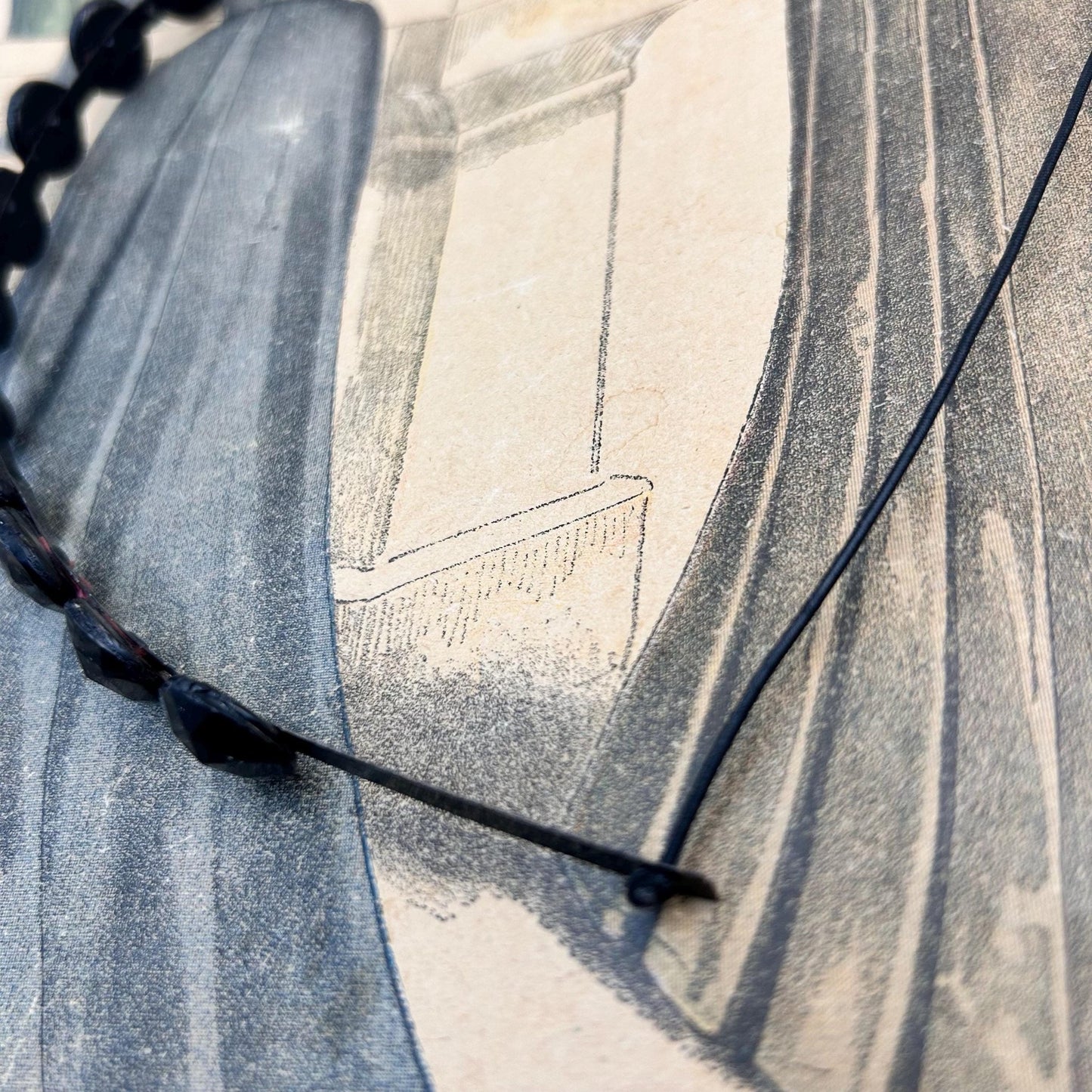 mourning tiara, hair jewellery of faceted black glass rounds on a black flexible metal band with elastic inserted to the back