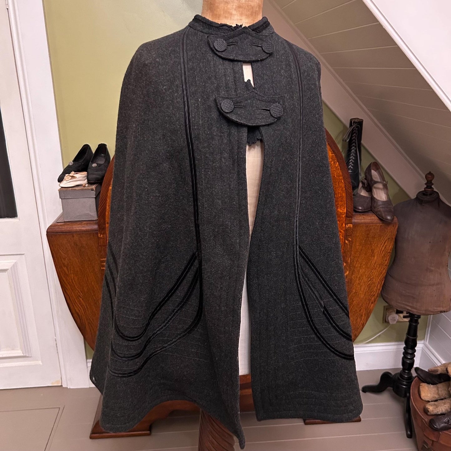 Antique Victorian dark grey wool cape on mannequin in room setting - Splendid Vintage World