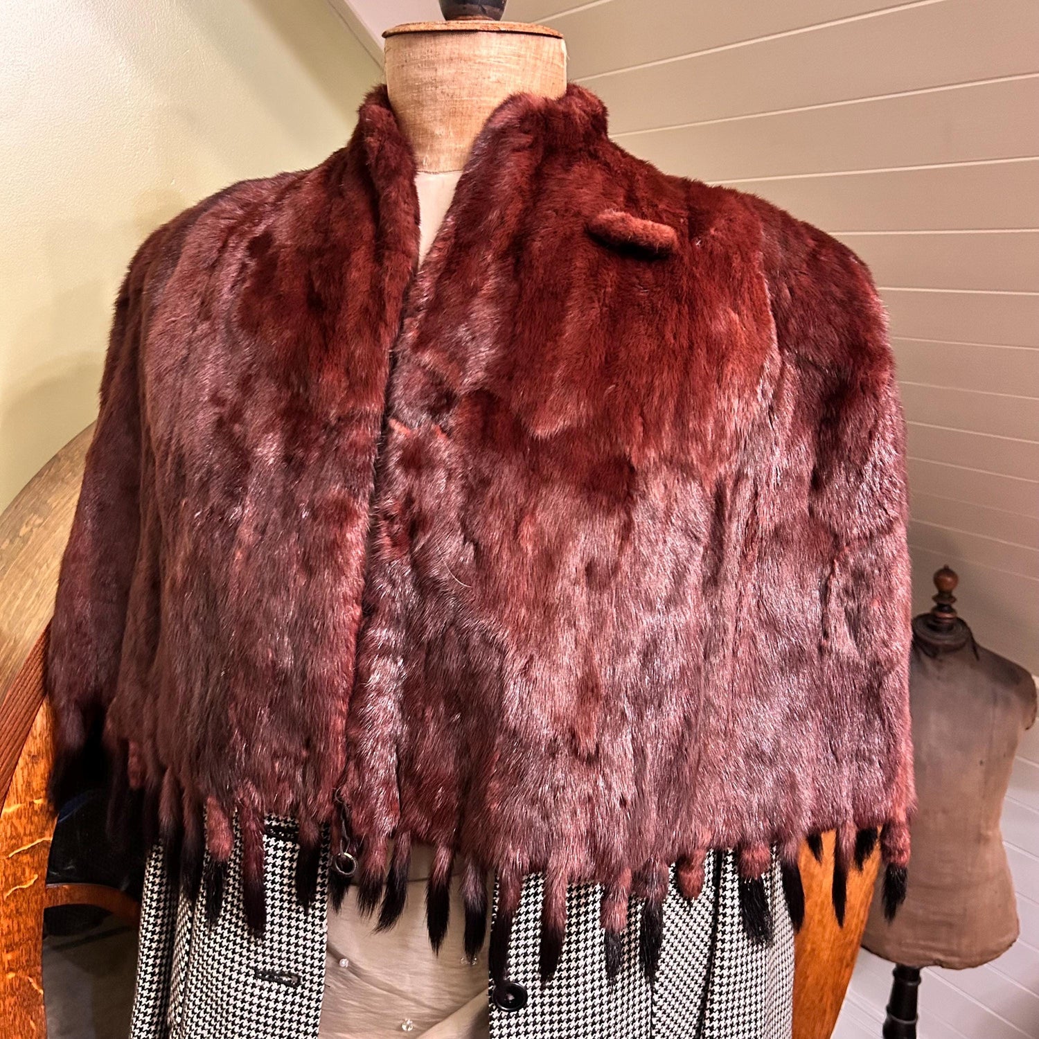 vintage fur cape on a mannequin in a light coloured room - Splendid Vintage World