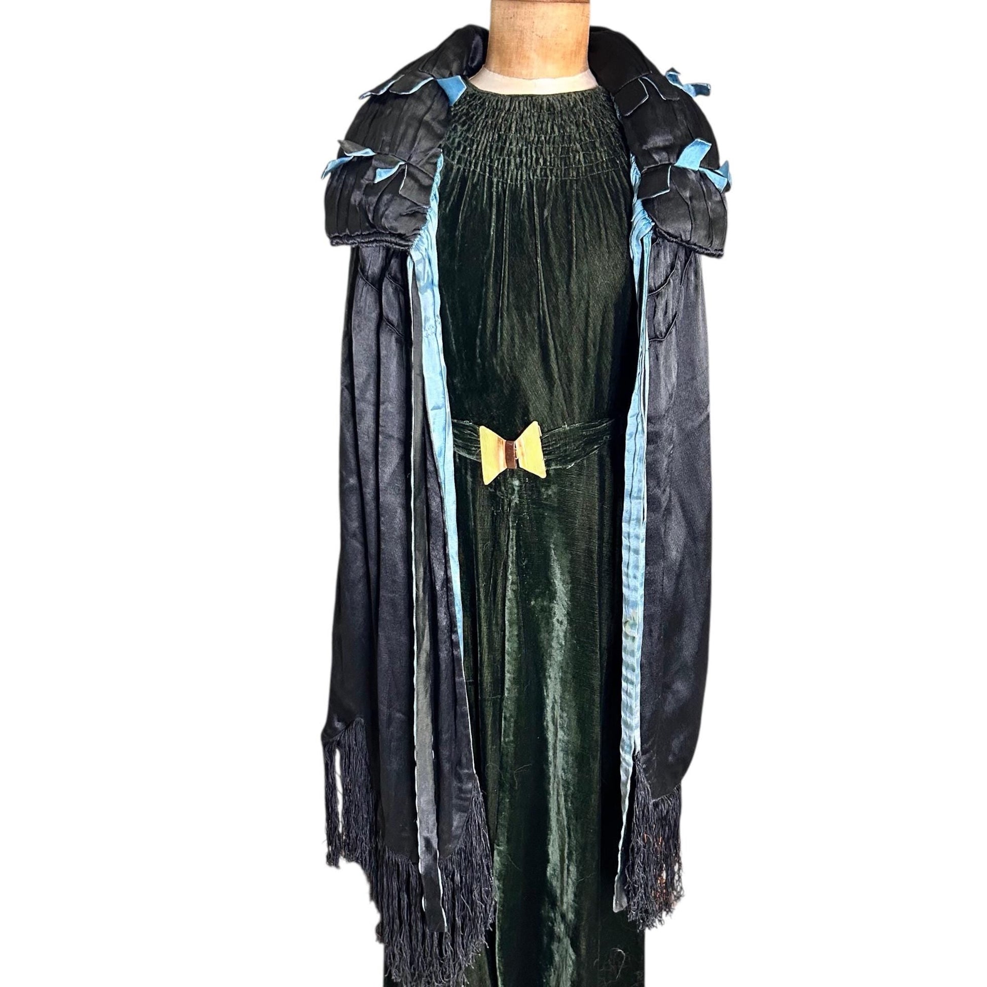1920s 30s Black & Blue cape with feature collar & silk fringe over dress on mannequin on white ground- Splendid Vintage World