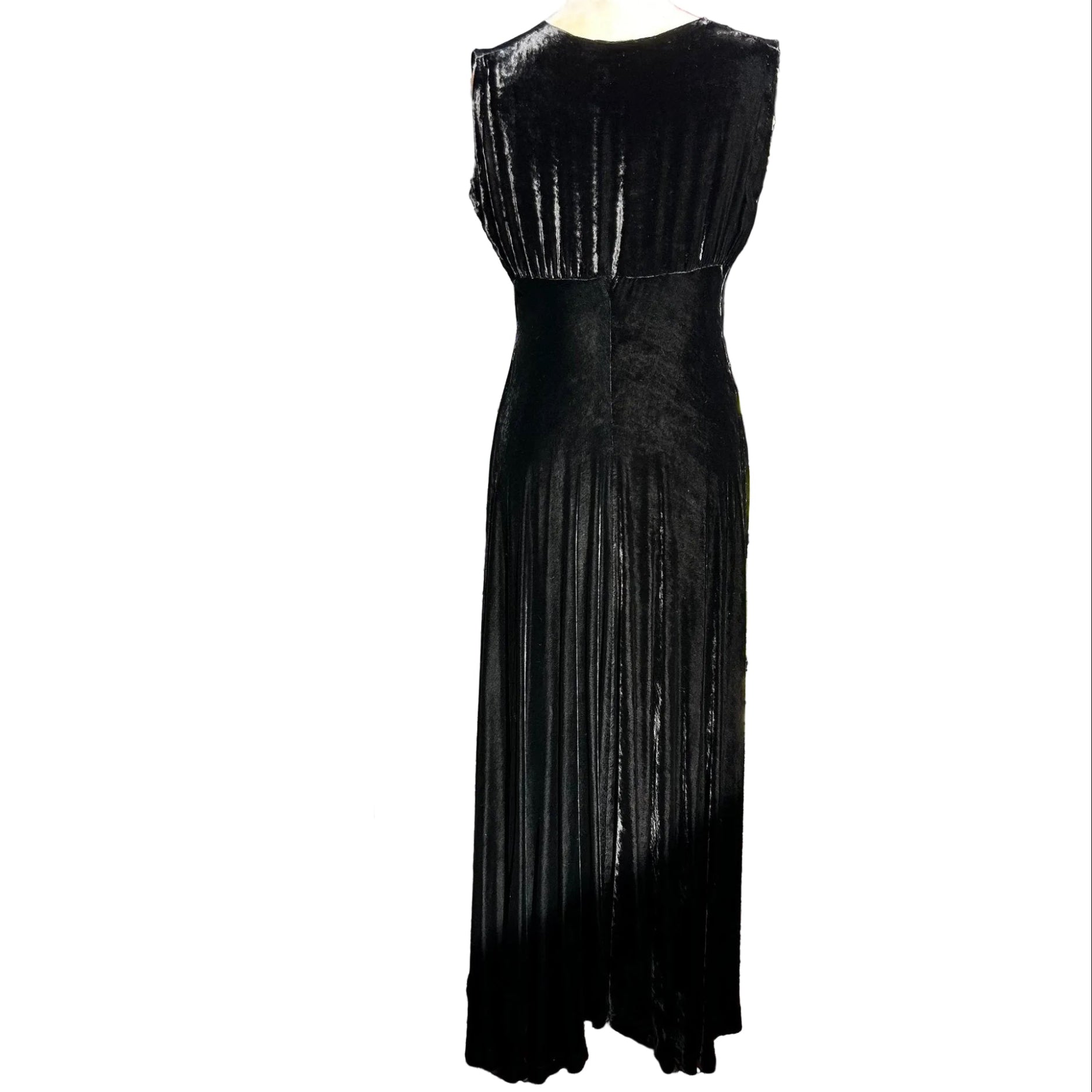 back view of 1930s long black velvet bias cut evening dress sleeveless on white background- Splendid Vintage World