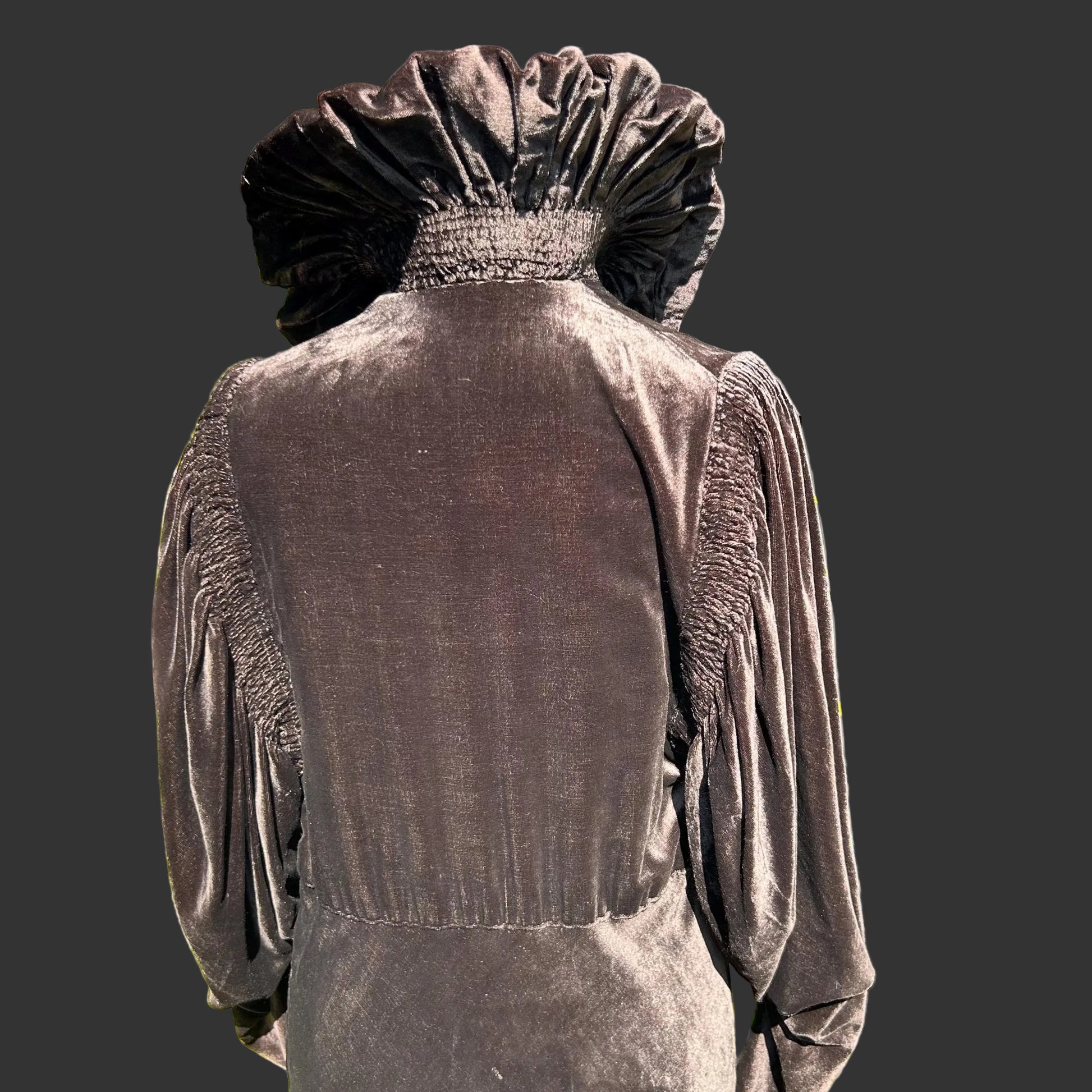 back view of upturned Dark Brown Velvet Collar Smocked Sleeves & back bodice of coat on dark backing - Splendid Vintage World