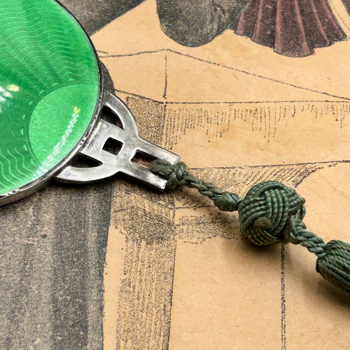 1931 Sterling silver guilloche enamel purse mirror in green sunburst with tassel - Splendid Vintage World