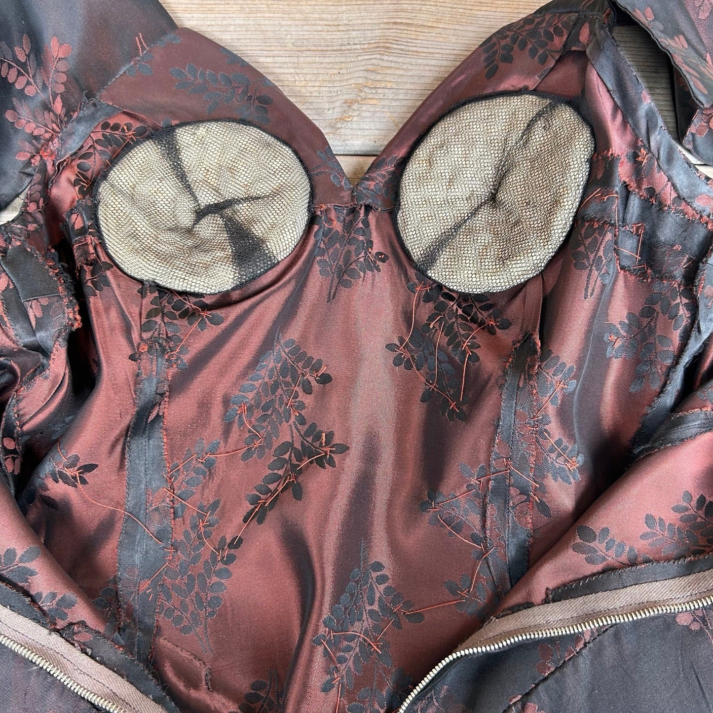 inside bodice of 1950s evening dress in black & pink floral damask showing bust pads - Splendid Vintage World