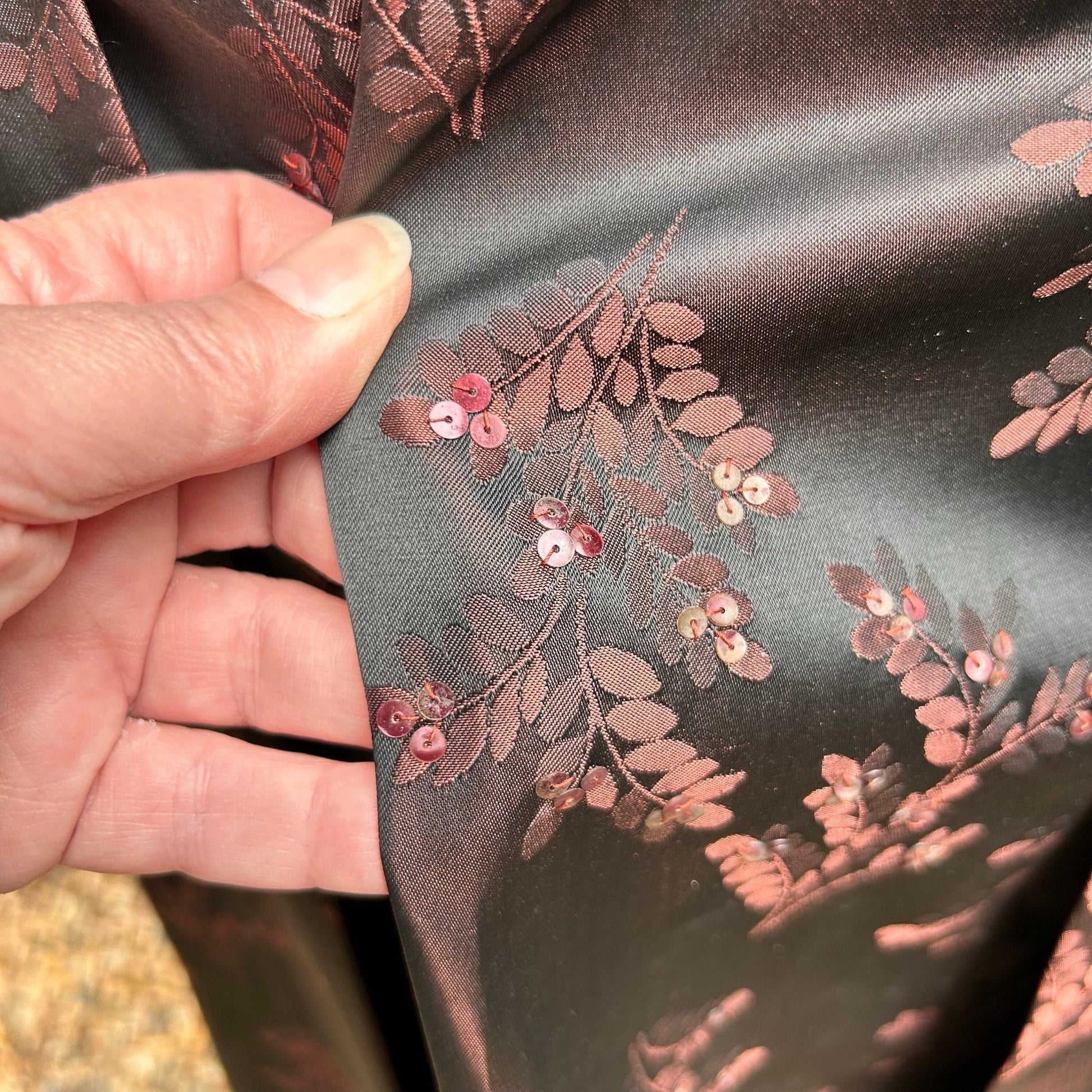 fault to dress black & pink floral damask held by hand - Splendid Vintage World