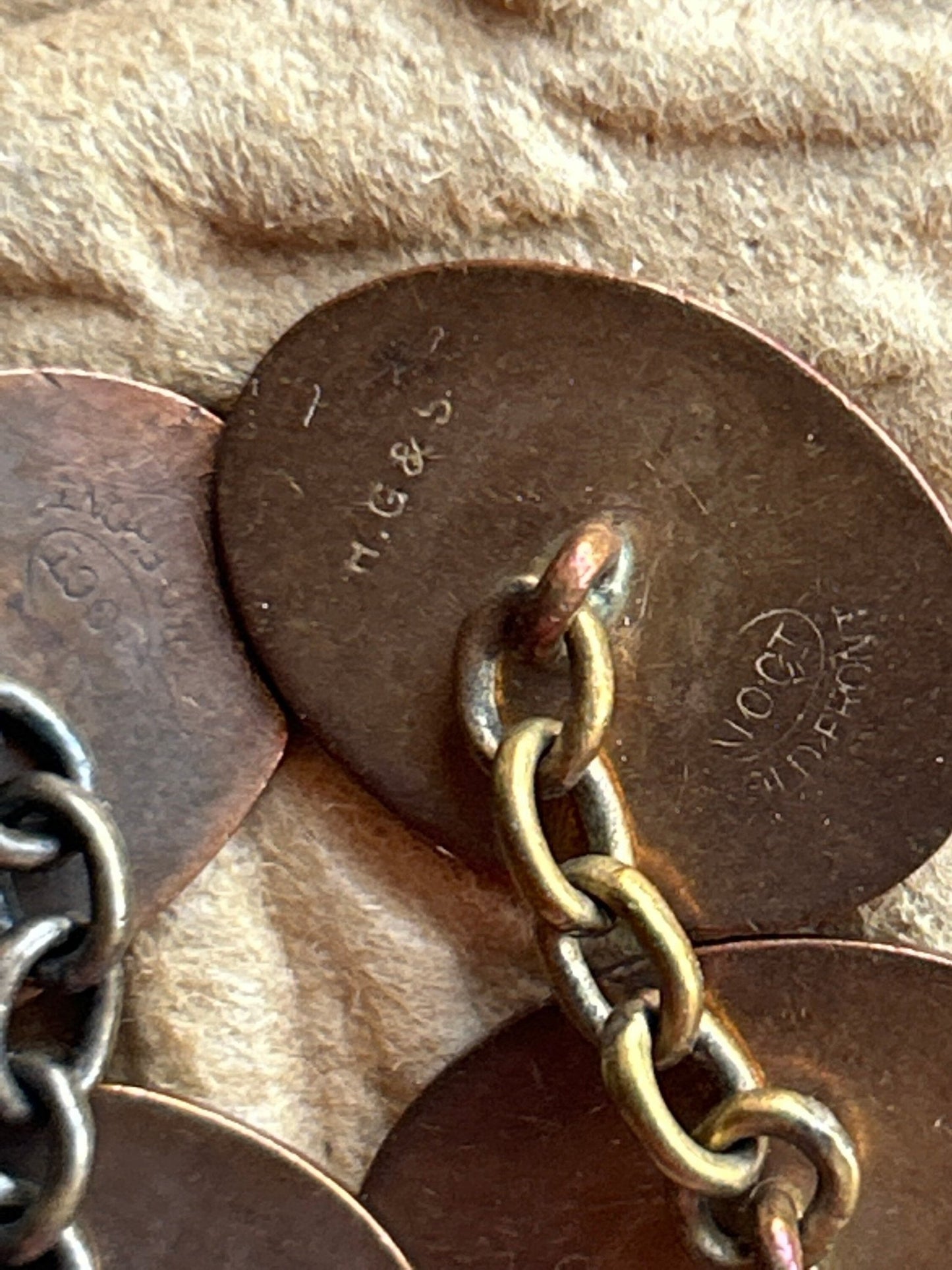 close up of back of oval 10ct gold front cufflinks stamped H.G & S with chains - Splendid Vintage World