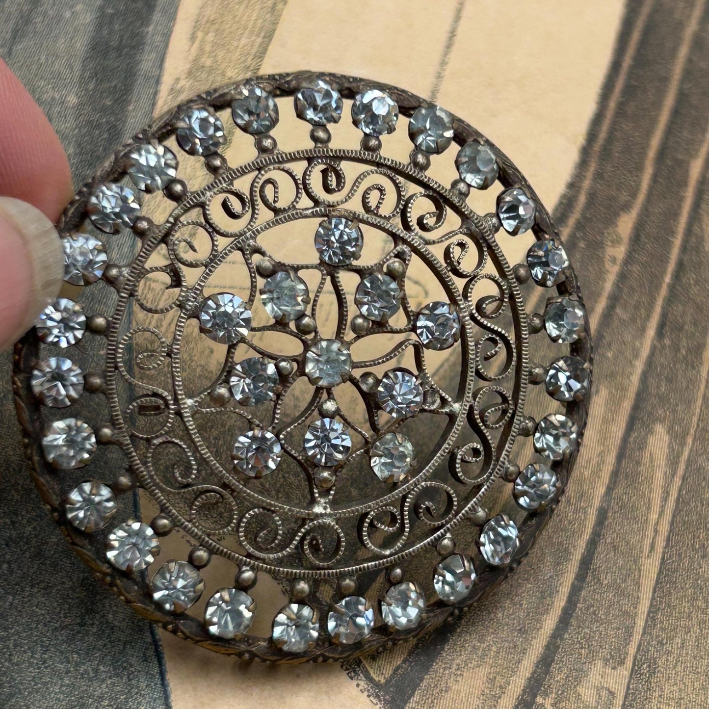 Antique diamanté filigree hair decoration or dress adornment. Circular & complete & has 4 loops to the back for attaching