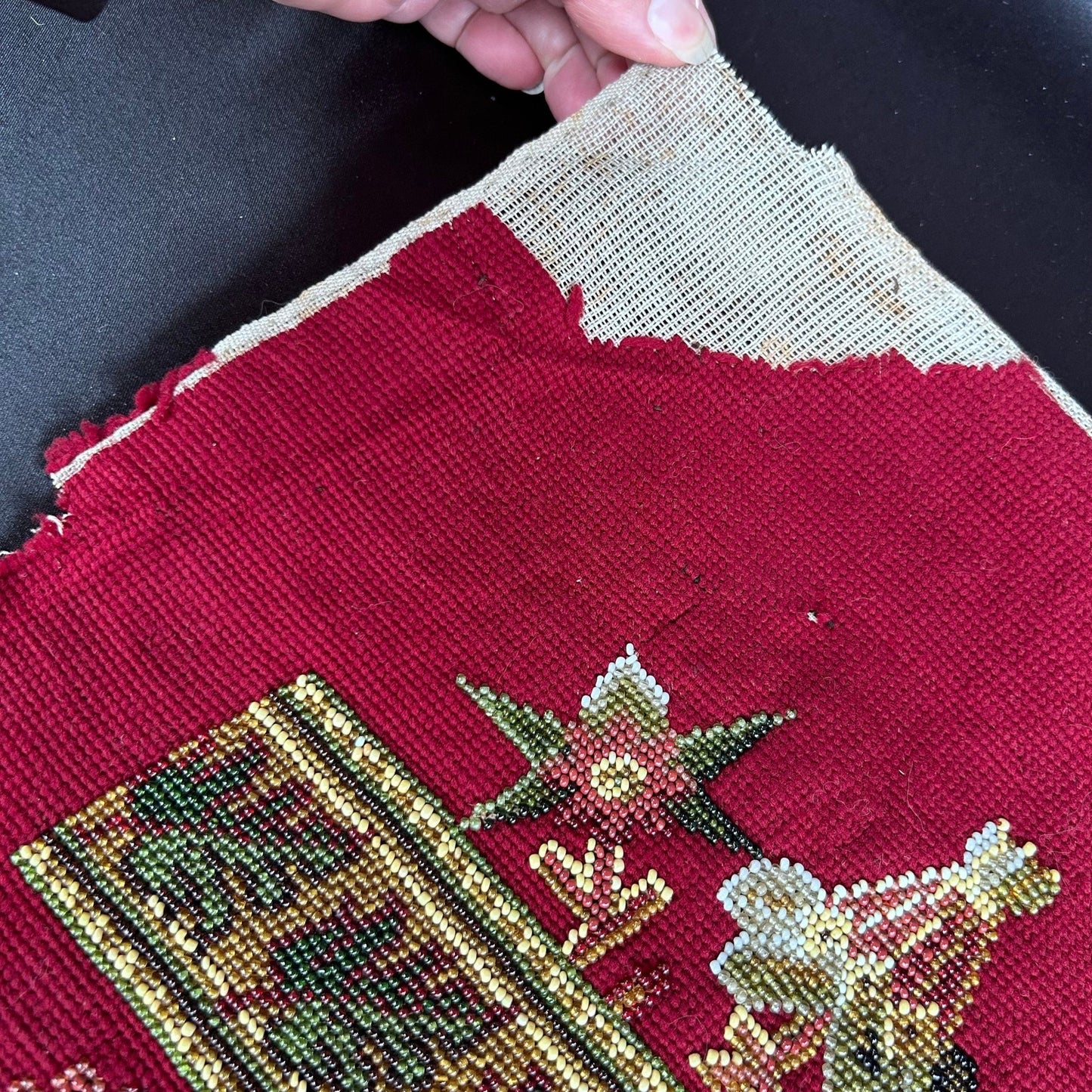 Close up corner detail of the Antique Beadwork & tapestry textile panel, which may have been a screen pole decorative panel