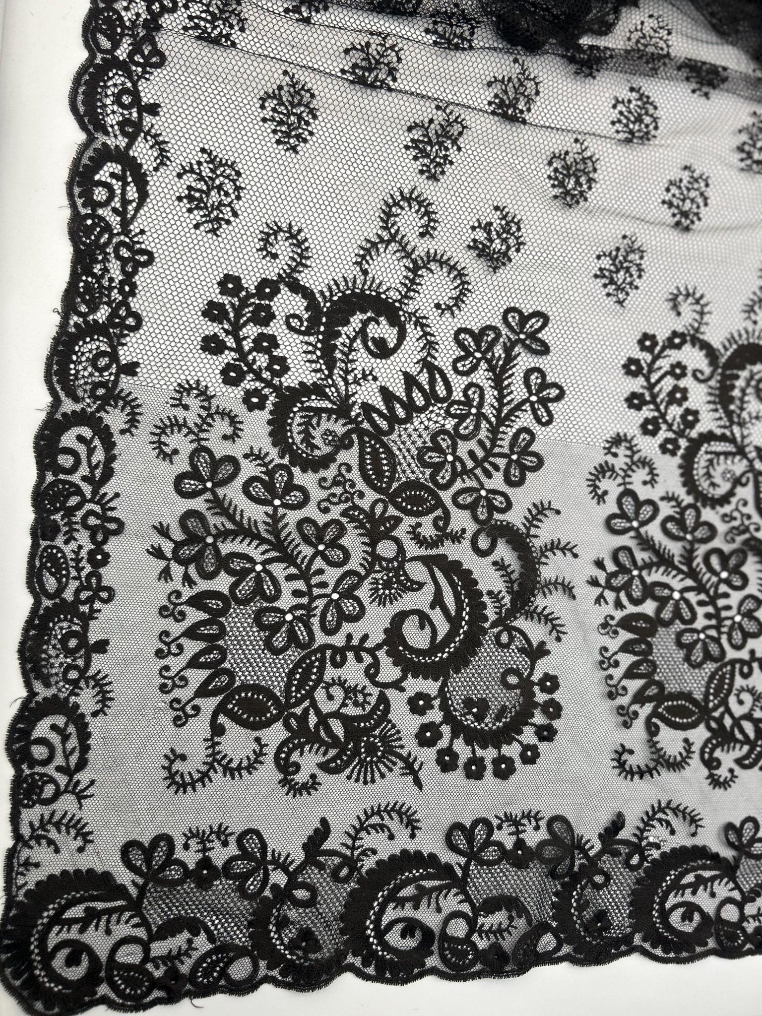 Antique black lace bonnet veil, lace panel close up of larger floral detail