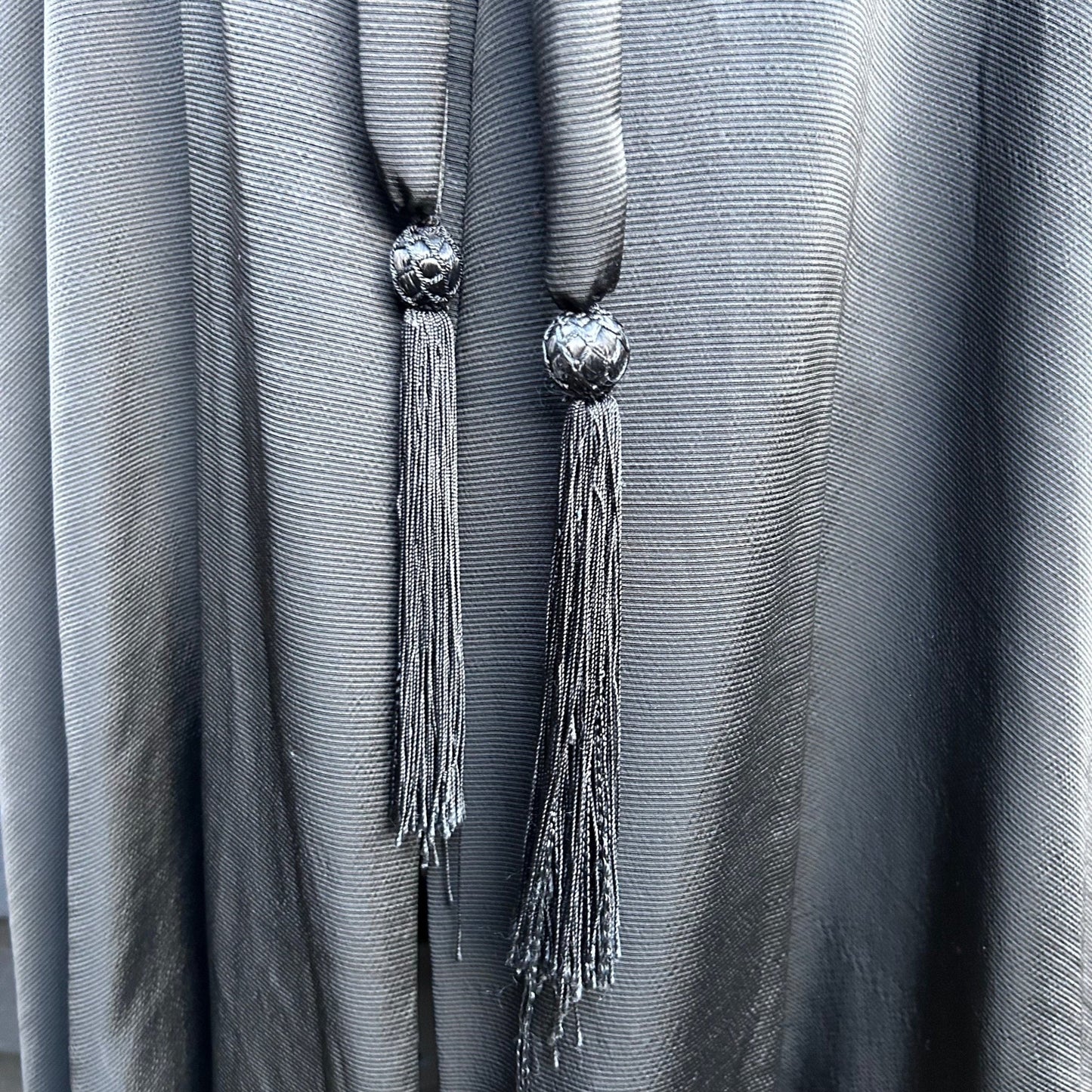 close up of black silk cape tassels - Splendid Vintage World