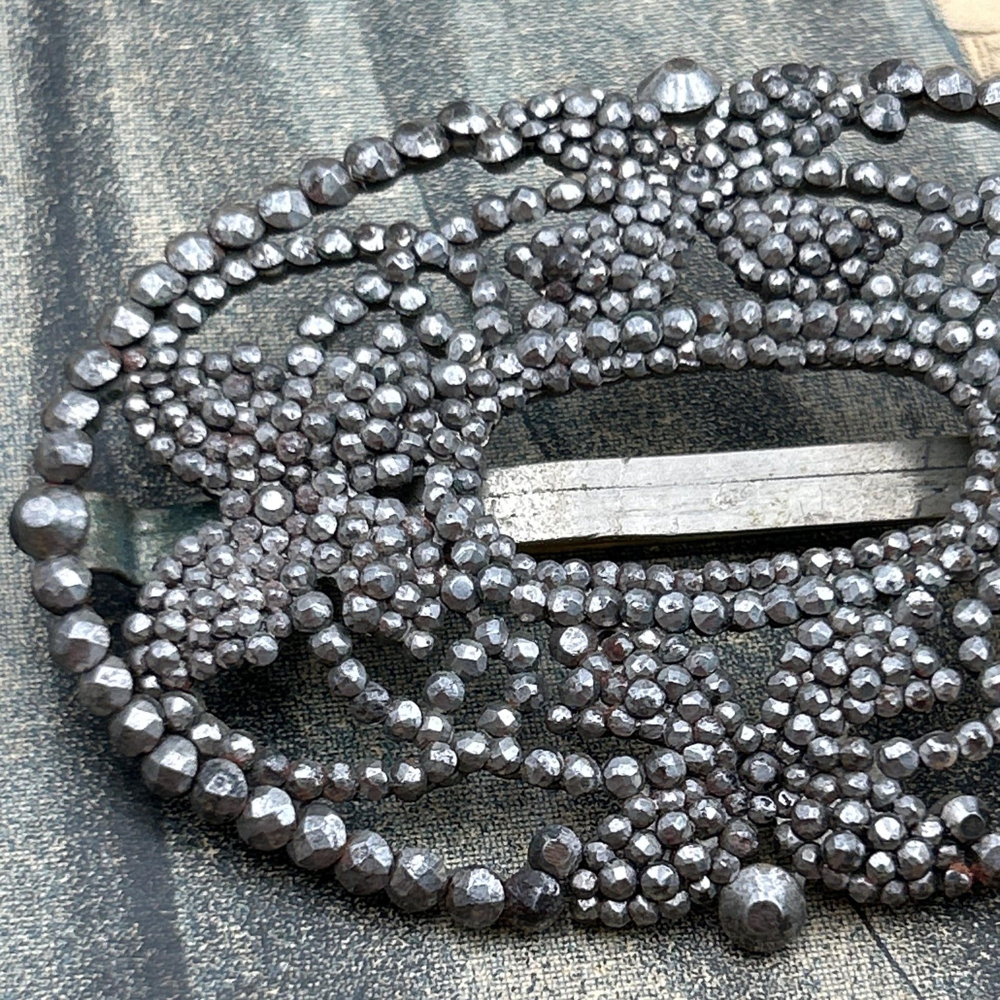 Antique butterfly brooch cut steel pinned construction close up on grey background - Splendid Vintage World