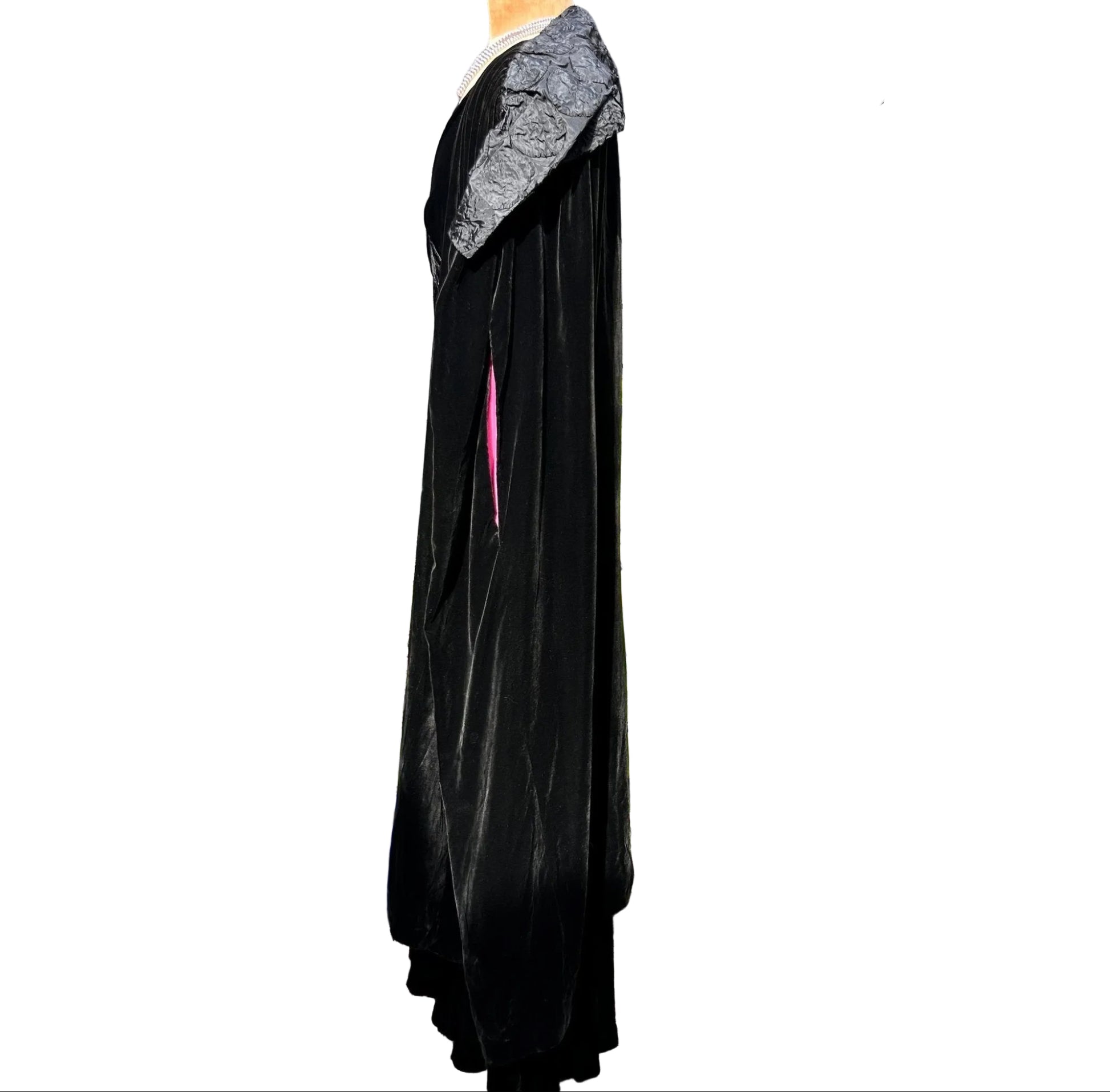 side view of Art Deco black velvet cocoon cape with feature collar on mannequin on white background - Splendid Vintage World