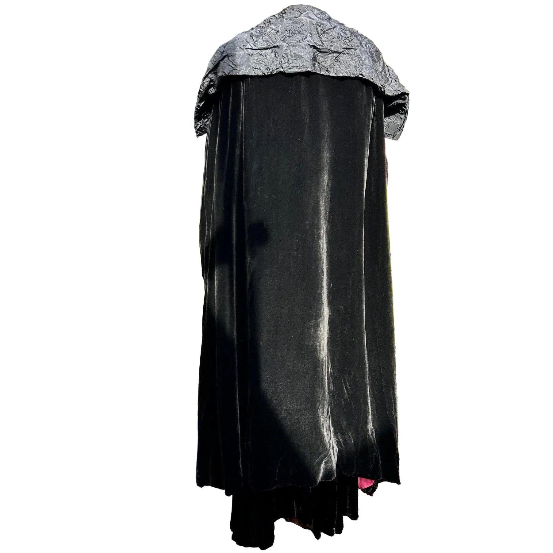 back view of full length Art Deco black velvet cocoon cape with feature collar on white background - Splendid Vintage World