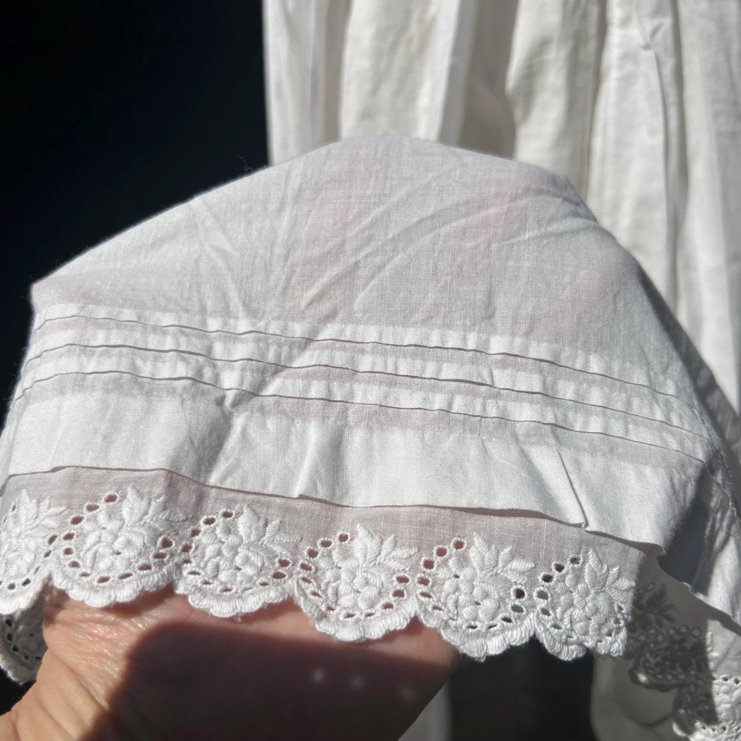 White Cotton Embroidery skirt hem held by hand - Splendid Vintage World