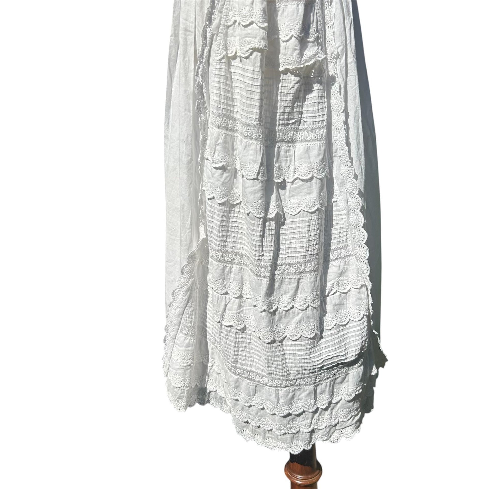 White Cotton Lace Embroidered apron front skirt of christening gown on white background - Splendid Vintage World