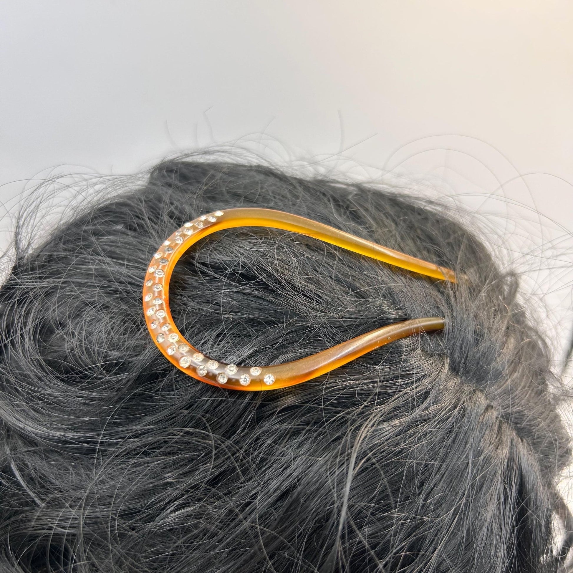 Antique hair comb in very good condition. faux tortoiseshell with clear paste stones All stones present , completely wearable