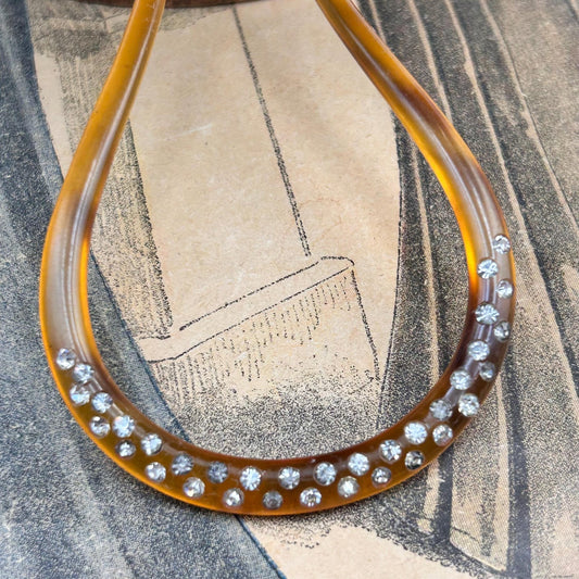 Antique hair comb in very good condition. faux tortoiseshell with clear paste stones All stones present , completely wearable