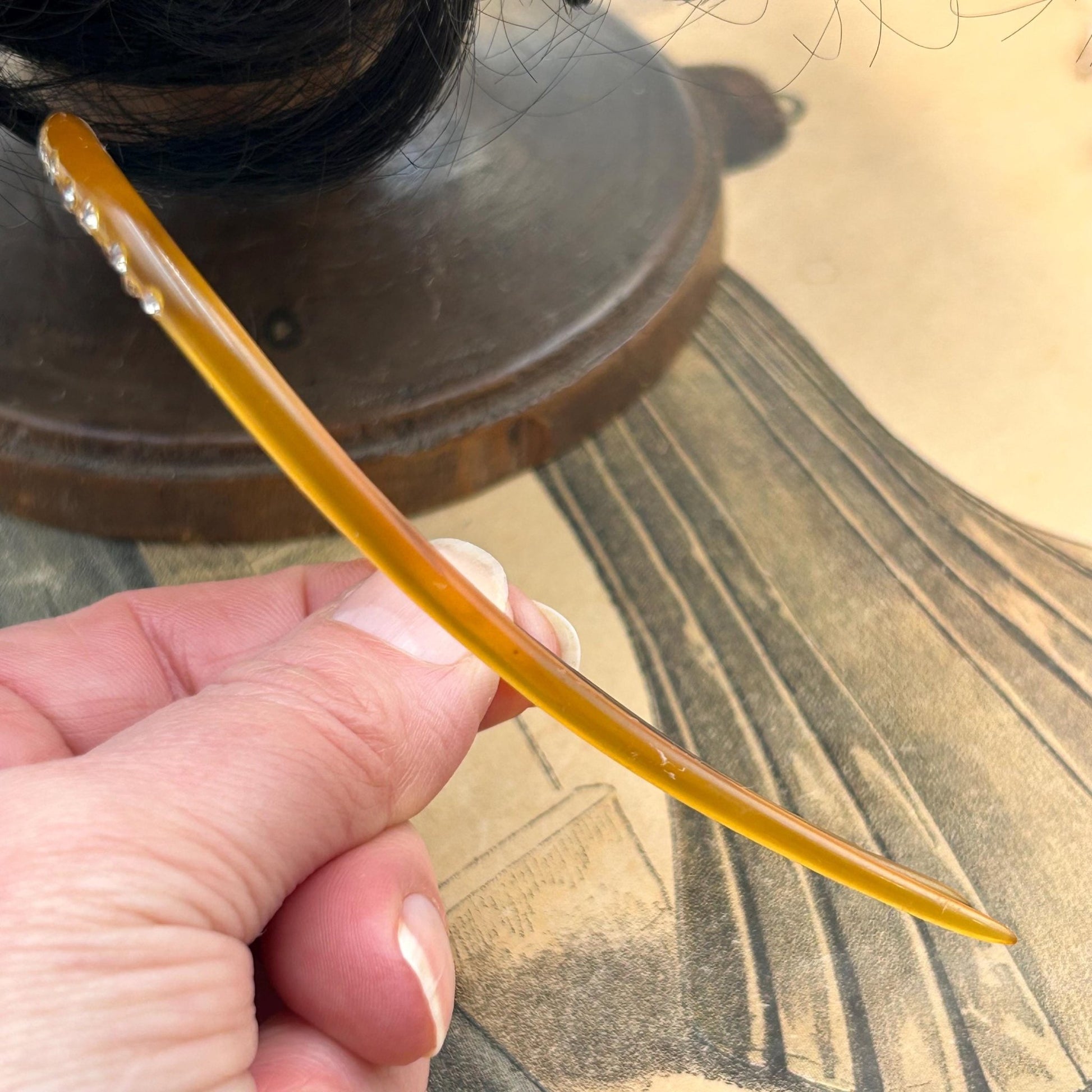 Antique hair comb in very good condition. faux tortoiseshell with clear paste stones All stones present , completely wearable