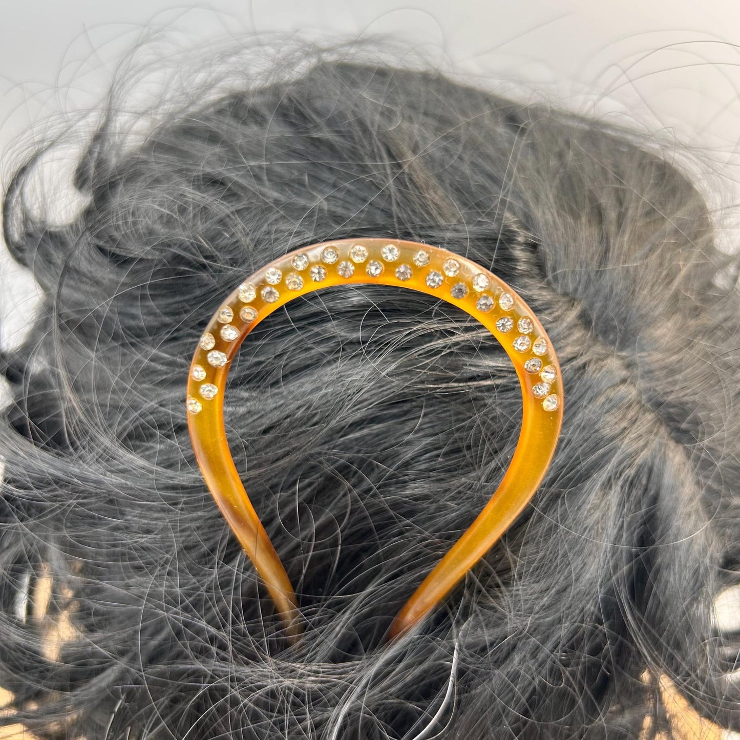Antique hair comb in very good condition. faux tortoiseshell with clear paste stones All stones present , completely wearable