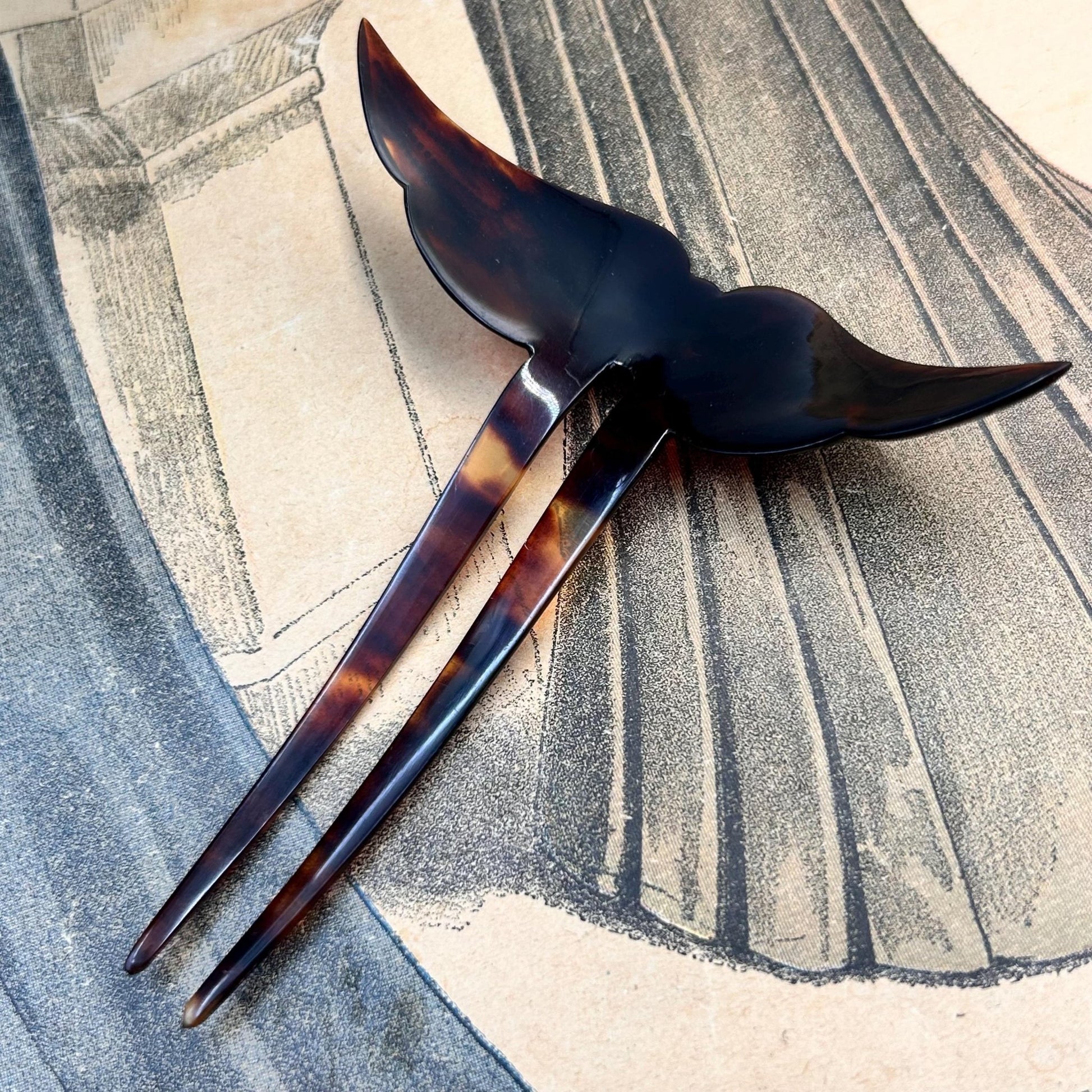Antique Edwardian faux tortoiseshell hair pin decoration on printed magazine  - Splendid Vintage World