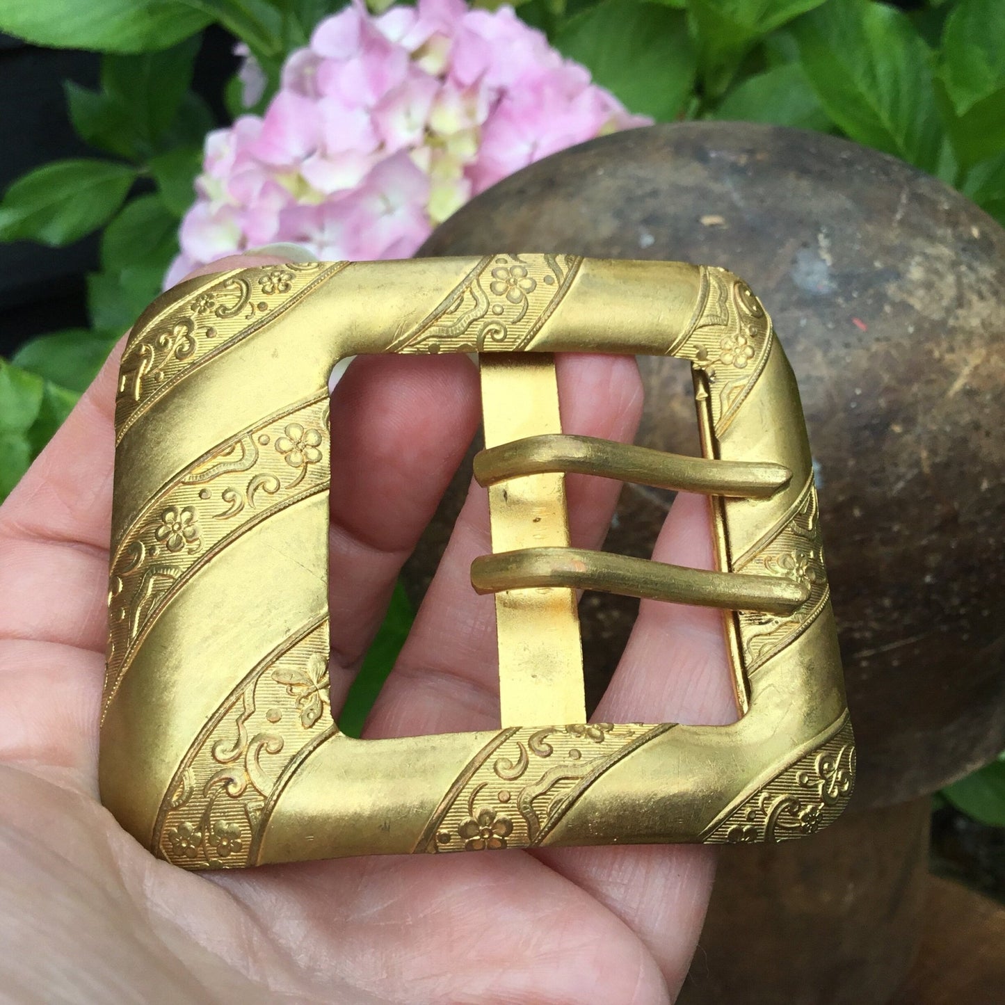 Antique Edwardian gilt metal buckle With floral & butterfly detail in between plain diagonal bands - Splendid Vintage World