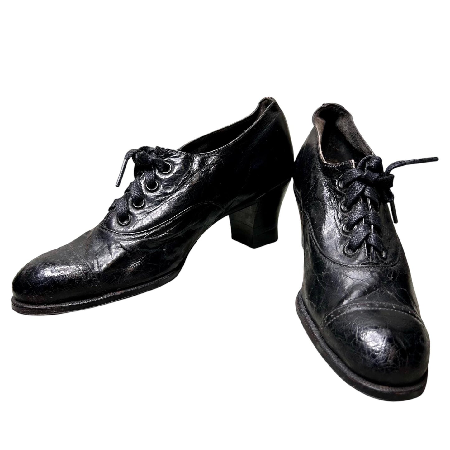 Antique Edwardian Ladies black leather lace up Oxford heeled shoes on white background- Splendid Vintage World