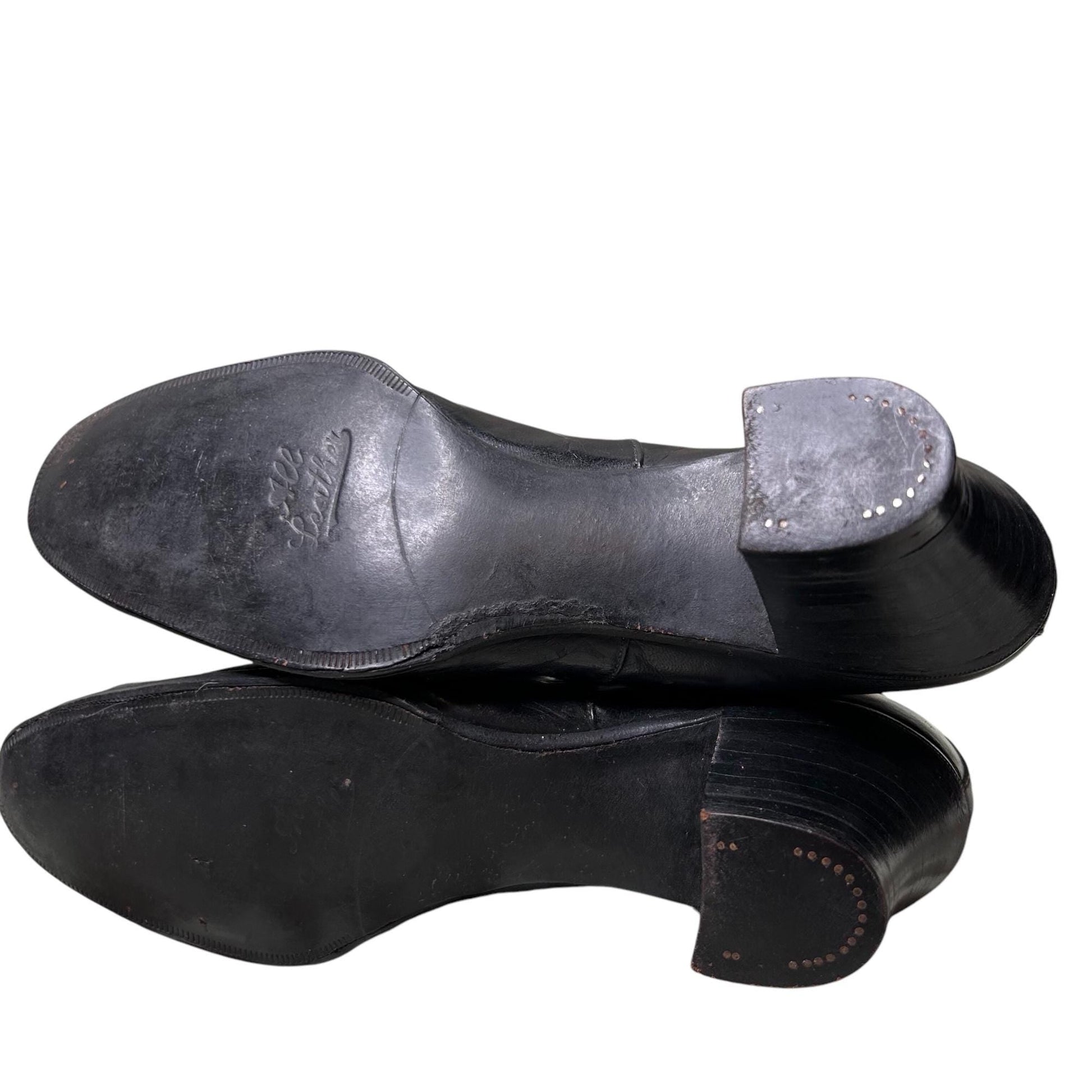 Edwardian Ladies black leather Oxford heeled shoes sole & heel close up on white background - Splendid Vintage World