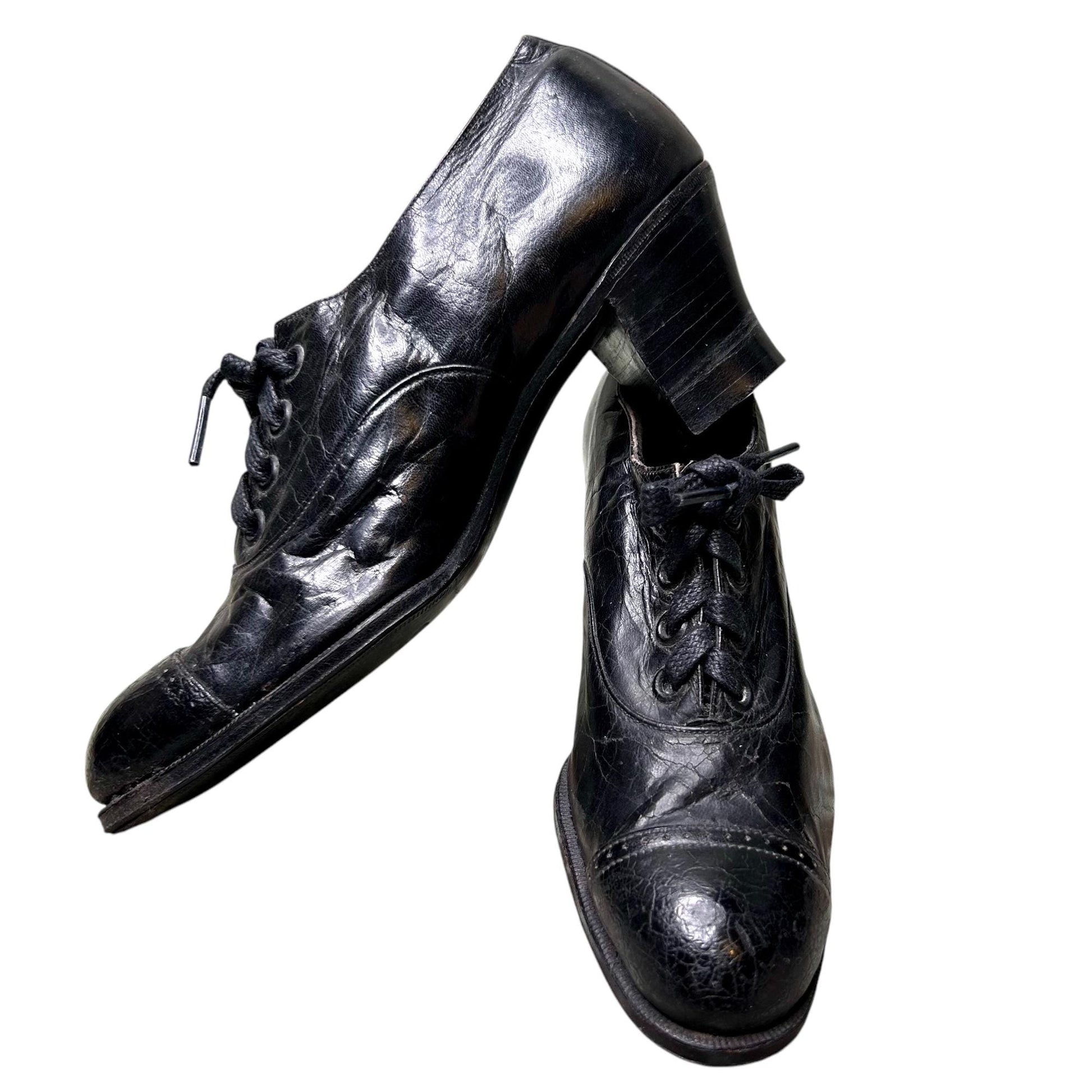 Antique Edwardian Ladies black leather lace up Oxford heeled shoes on white background - Splendid Vintage World