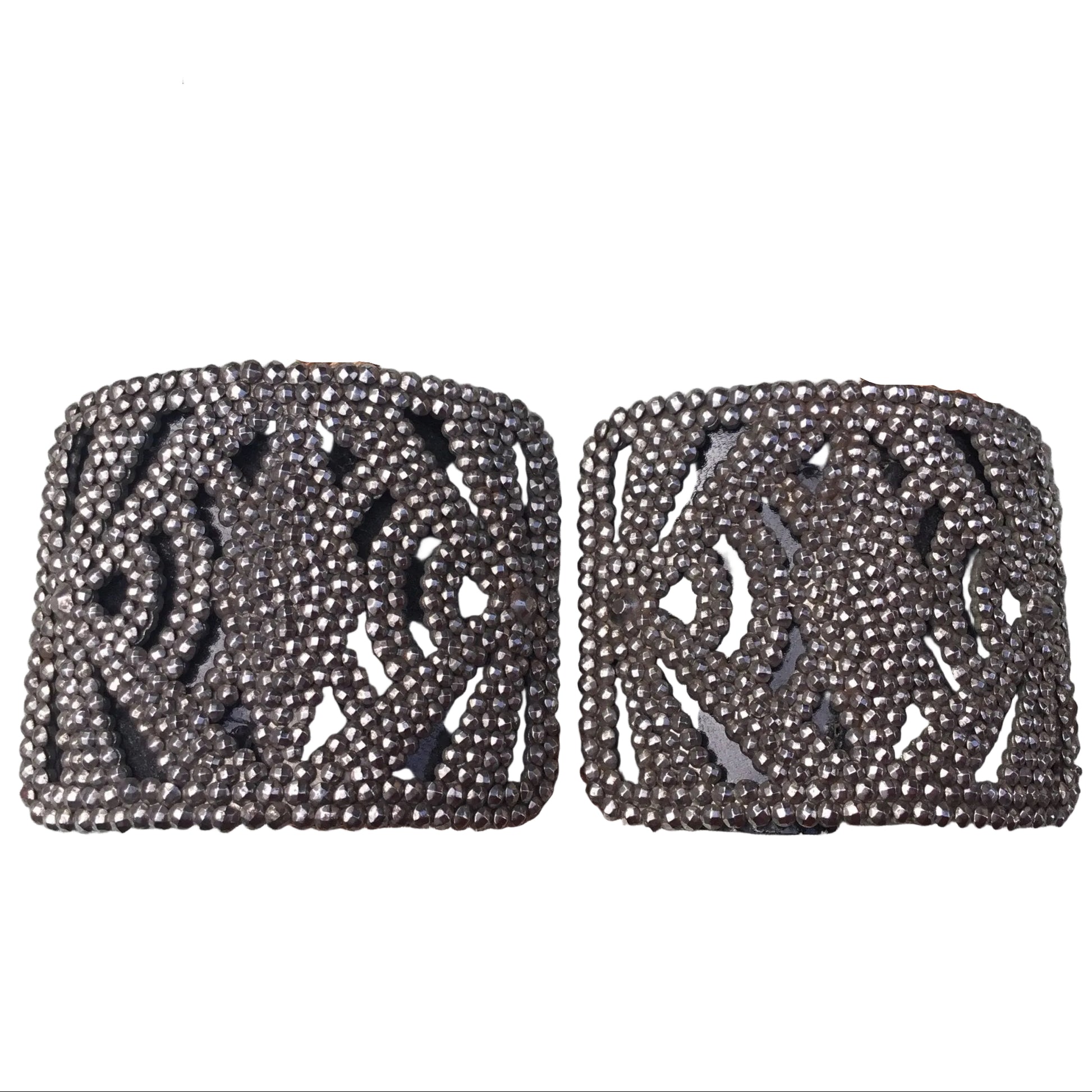 Antique French Cut Steel Shoe Buckles with geometric design against white background - splendid vintage world