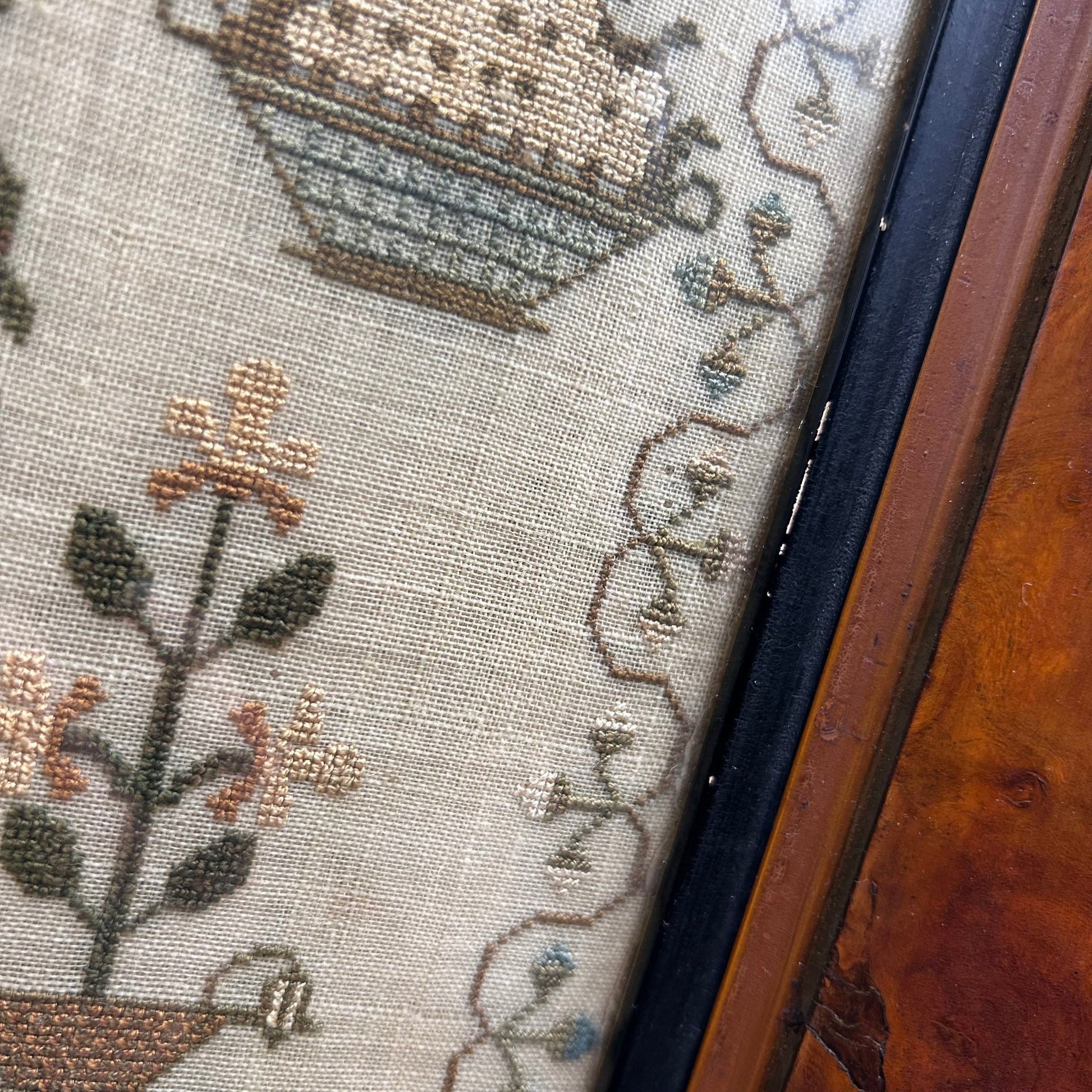 finely embroidered sampler floral borders trees & various flowering plants in Birds eye maple frame - Splendid Vintage World