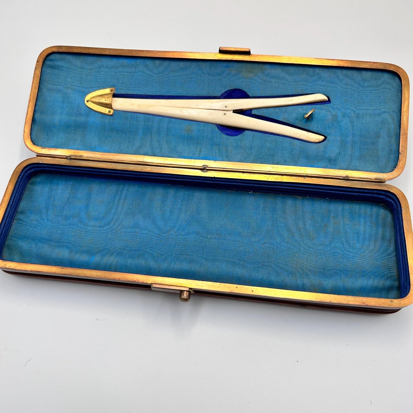internal view of the Antique leather expanding glove case, glove box lined in blue silk  with included glove stretchers