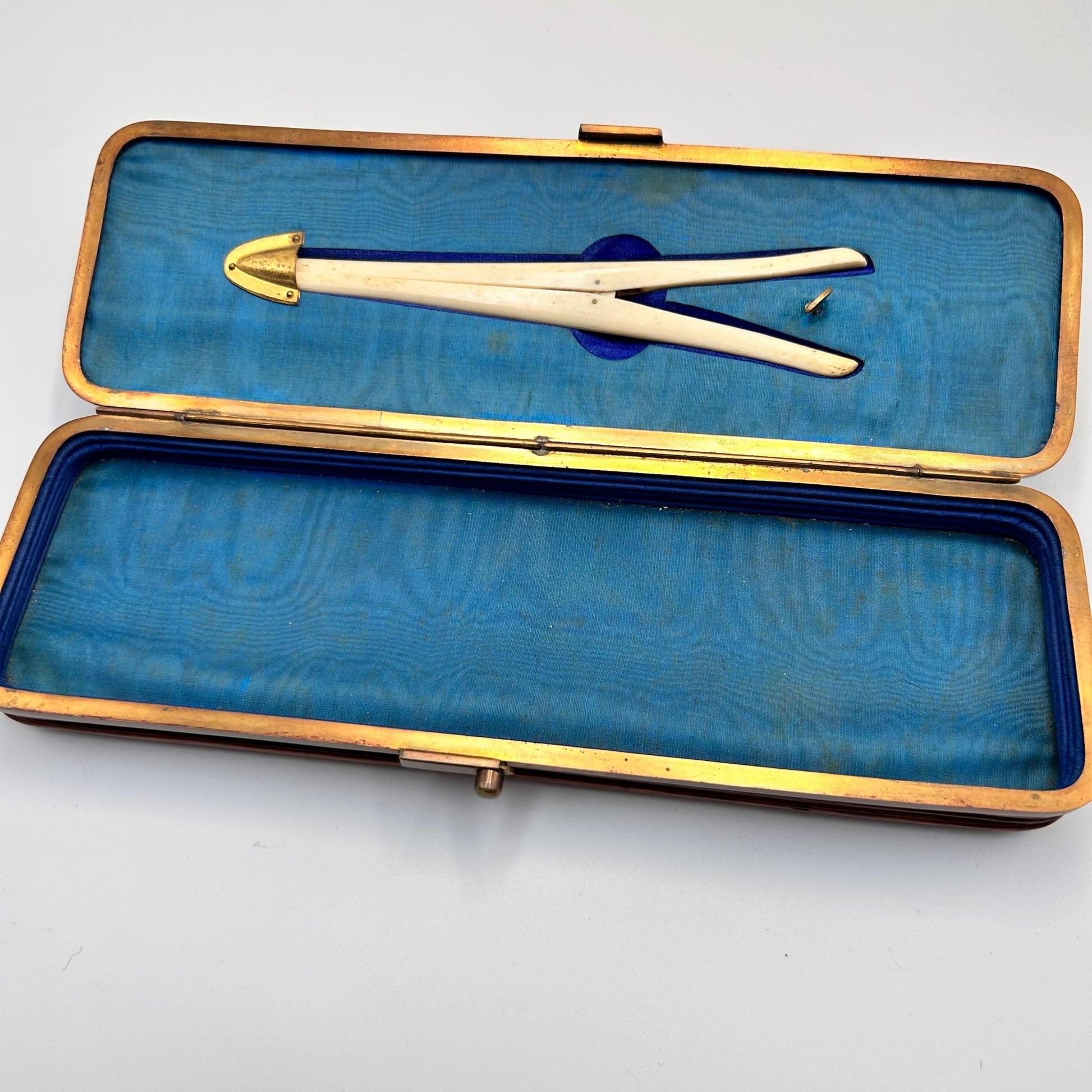internal view of the Antique leather expanding glove case, glove box lined in blue silk  with included glove stretchers
