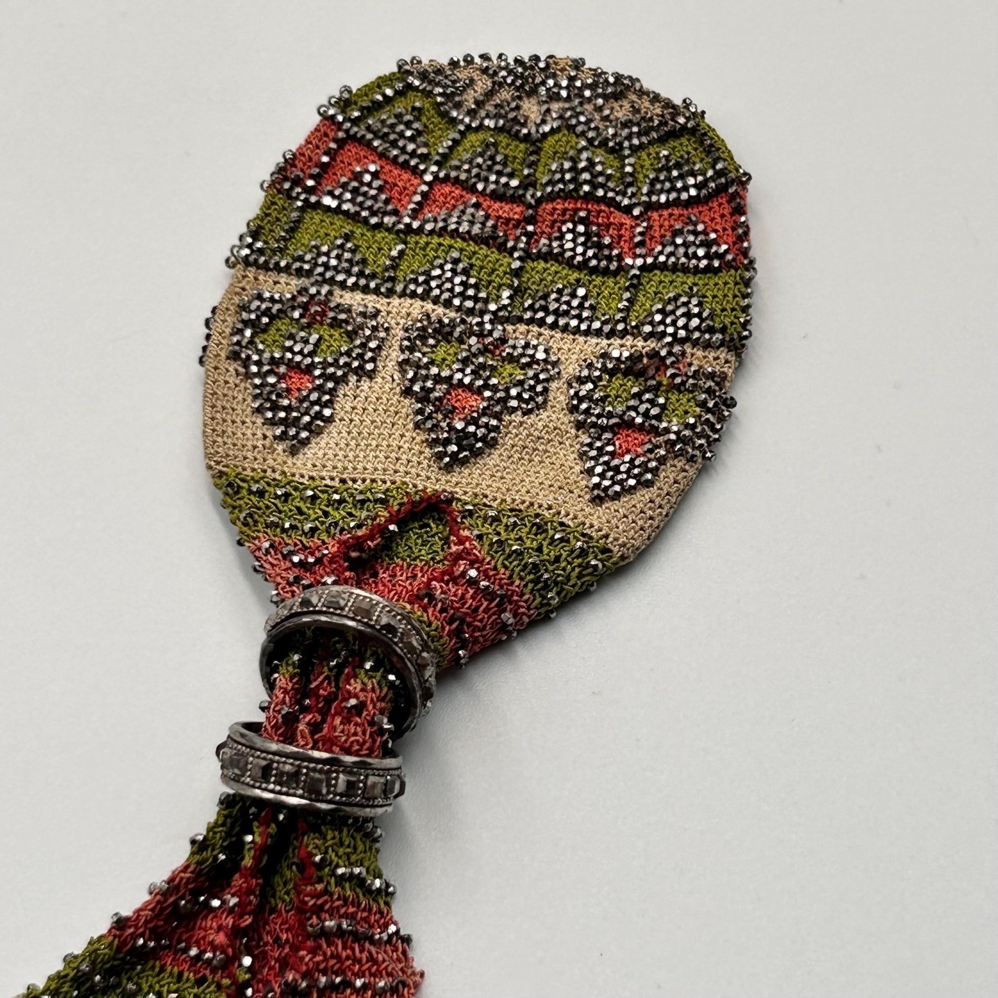 Antique misers purse with cut steel beading and fringe in green, red & beige 19 cm - Splendid Vintage World