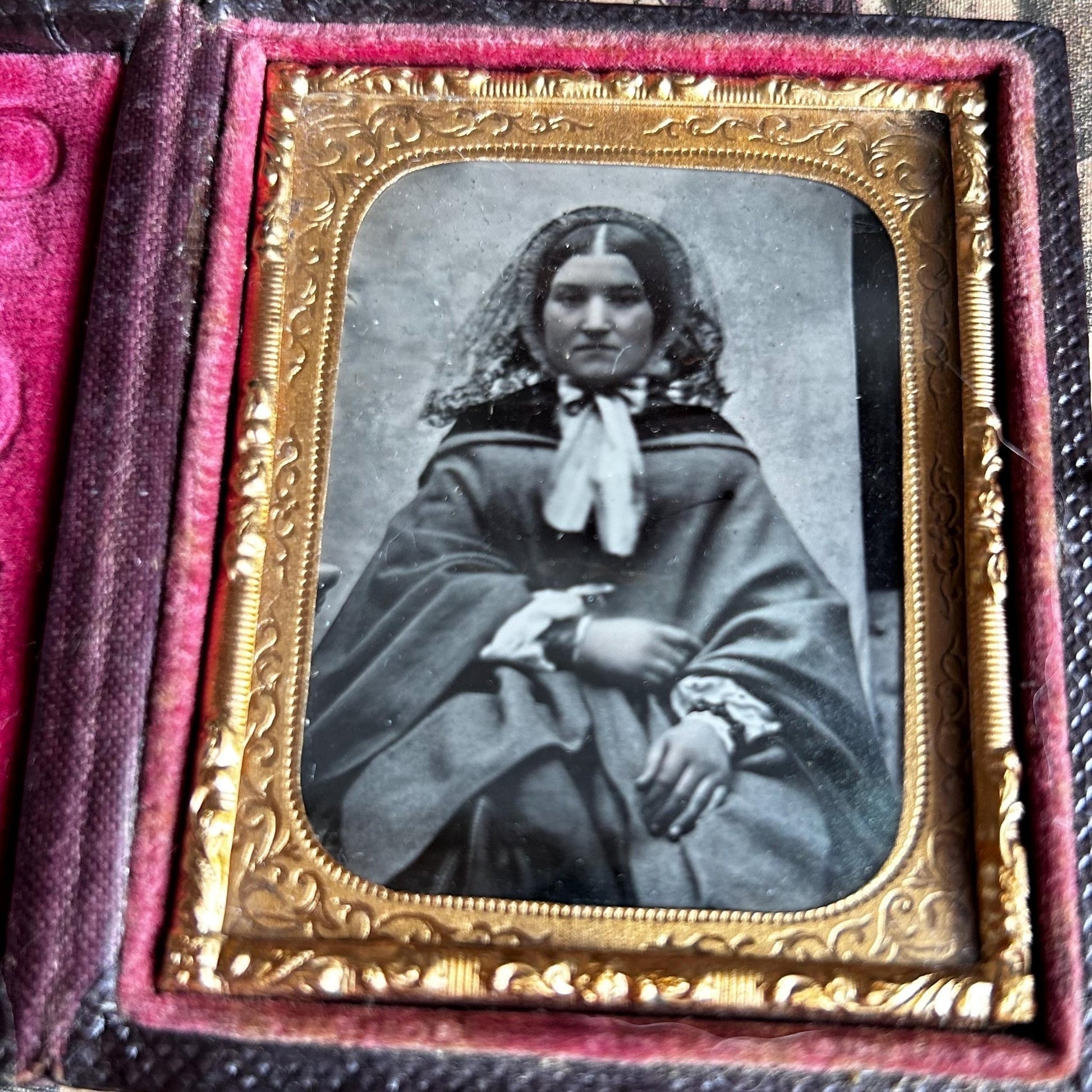 Antique Victorian ambrotype photo of lady in hooded cape in decorative gold frame in folding case - Splendid Vintage World