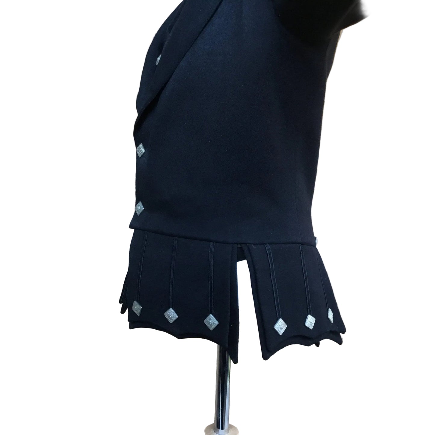Side view of Antique Victorian child’s jacket under sleeve in Fine Black wool with silver coloured square buttons