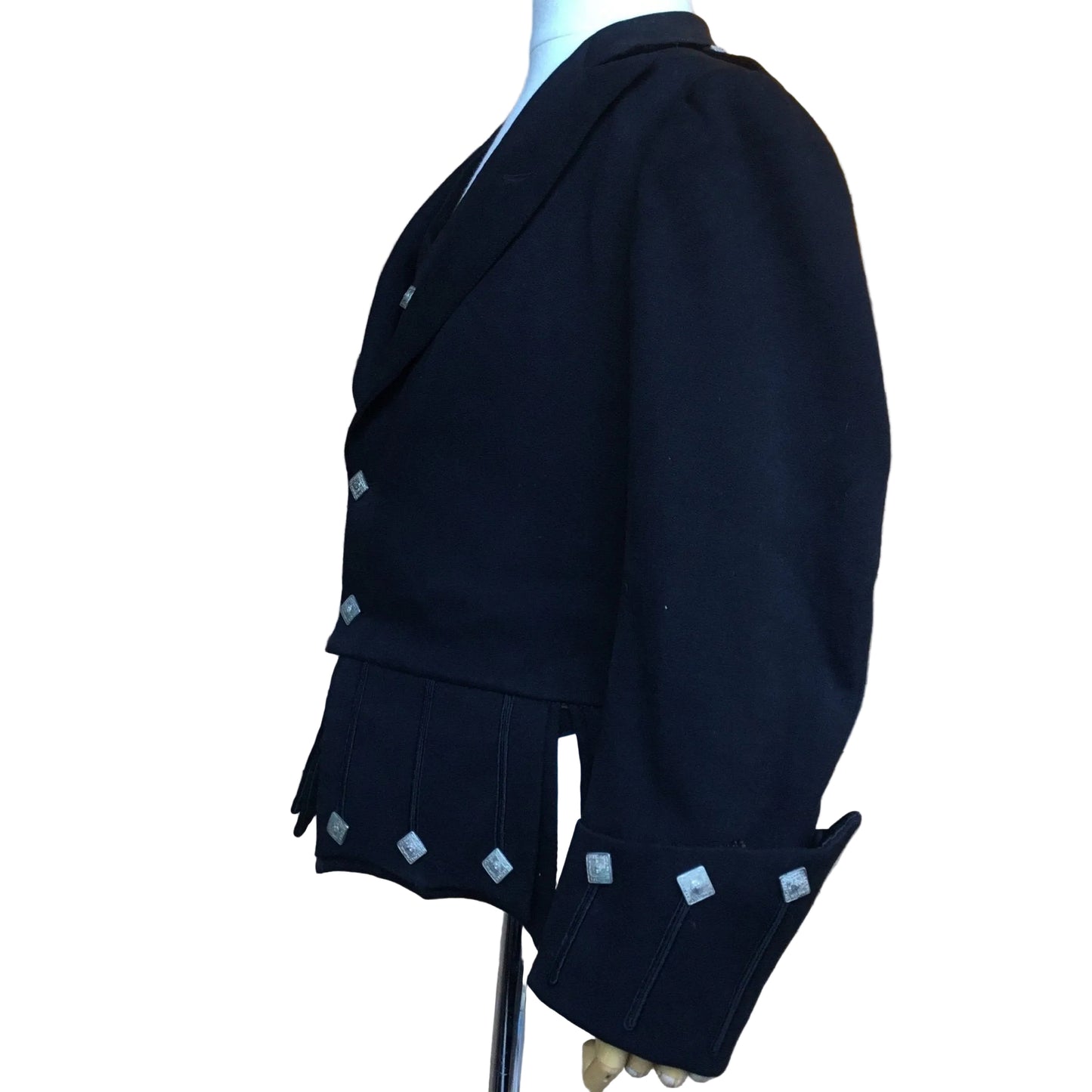 Side view of Antique Victorian child’s jacket in Fine Black wool with silver coloured square buttons