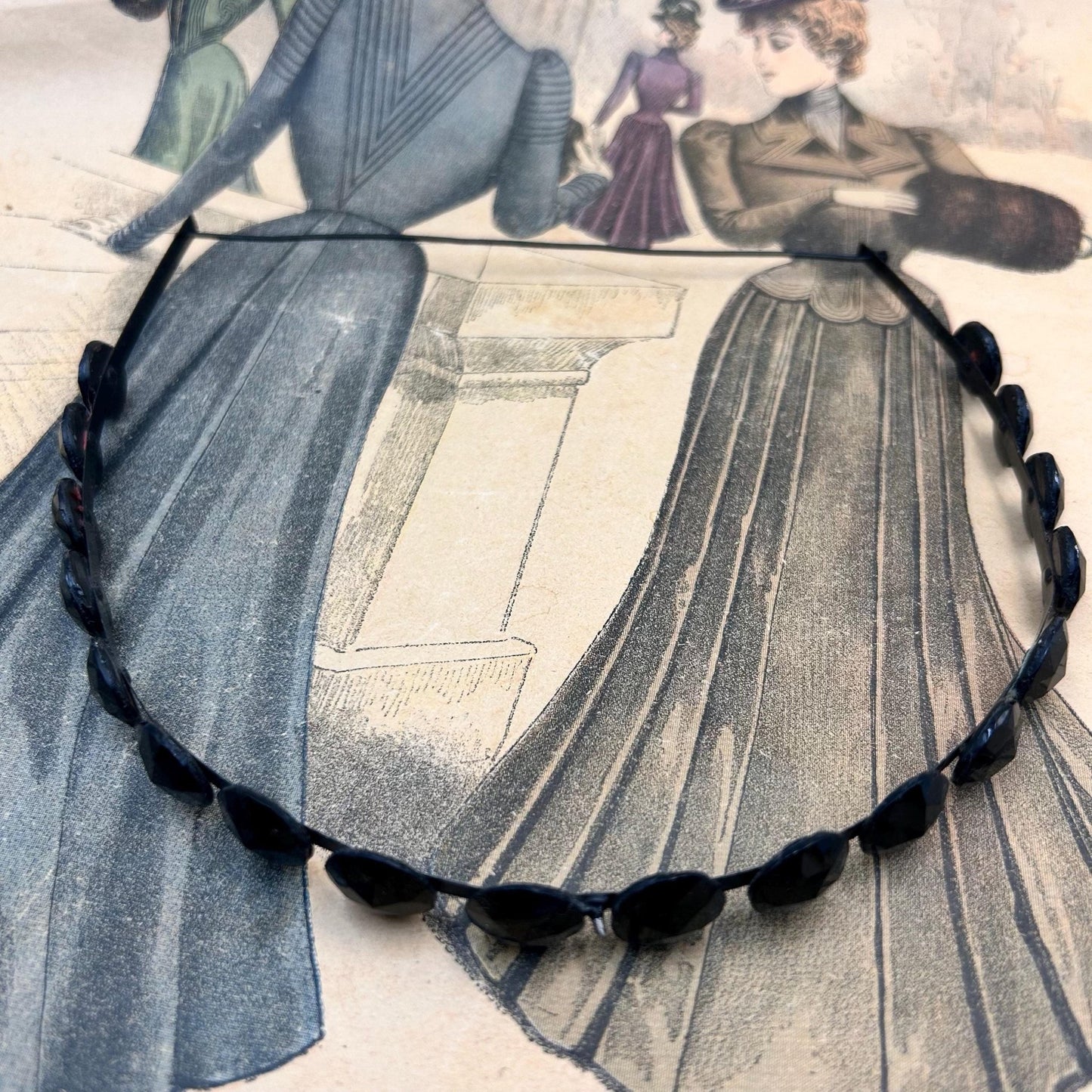 Antique Victorian black glass mourning tiara, hair jewellery of faceted black glass rounds on a black flexible metal band