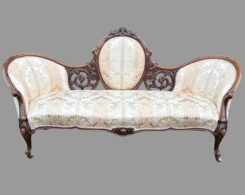 Victorian carved walnut cameo back sofa chaise on castors upholstered in beautiful traditional damask fabric