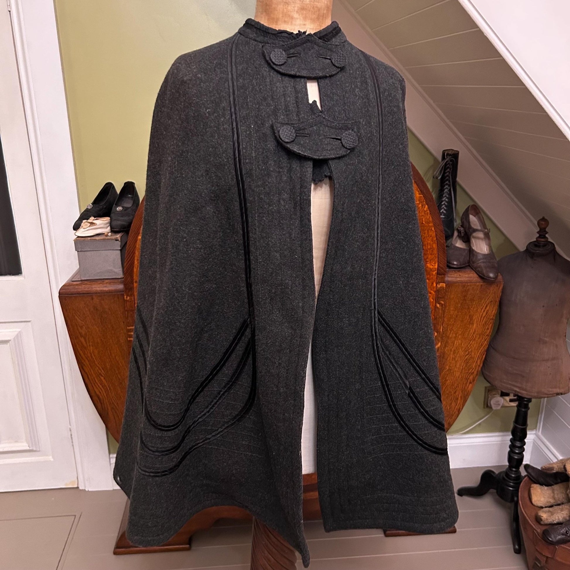 Antique Victorian dark grey wool cape on mannequin in room setting - Splendid Vintage World