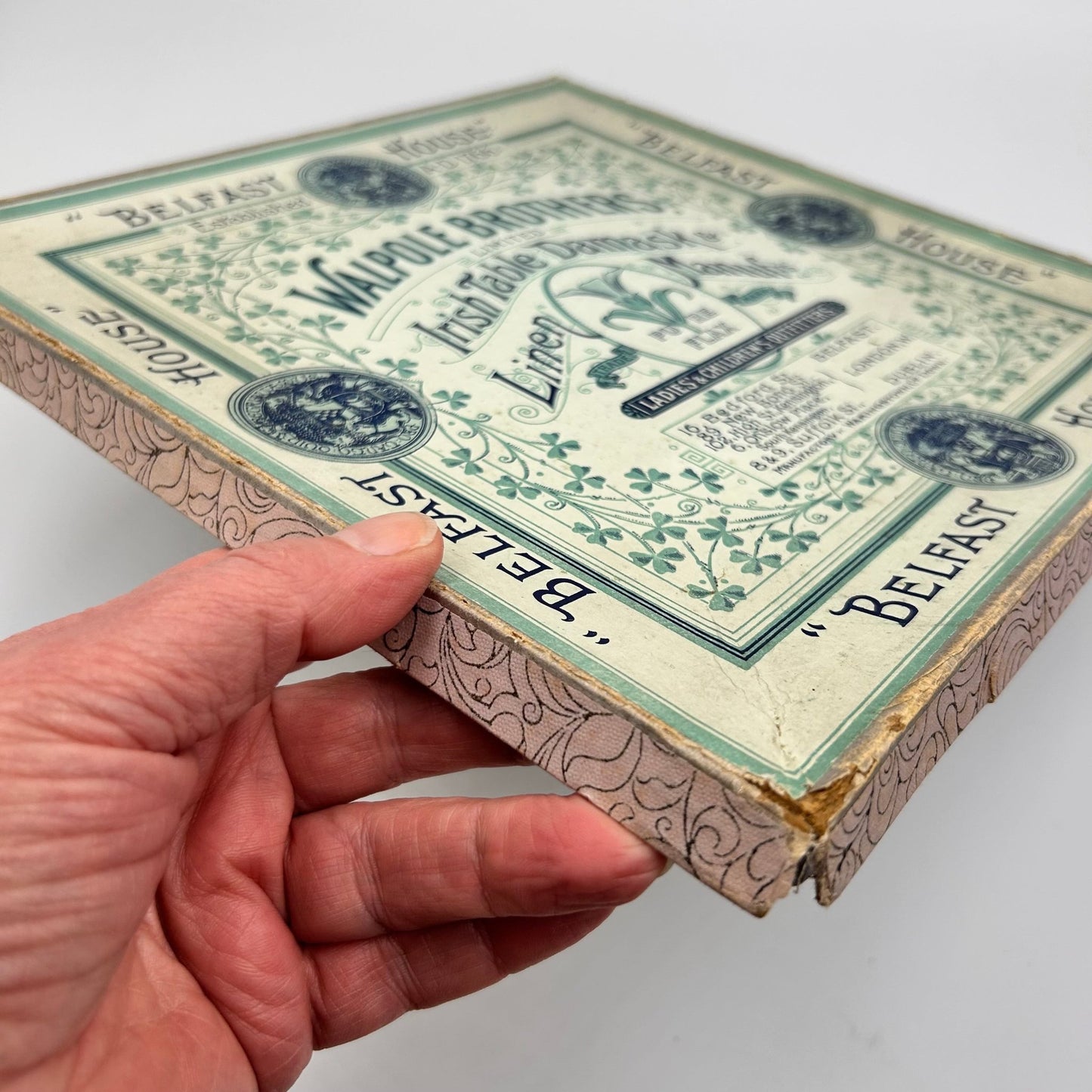 Antique Walpole brothers Linen handkerchiefs box held by hand - Splendid Vintage World