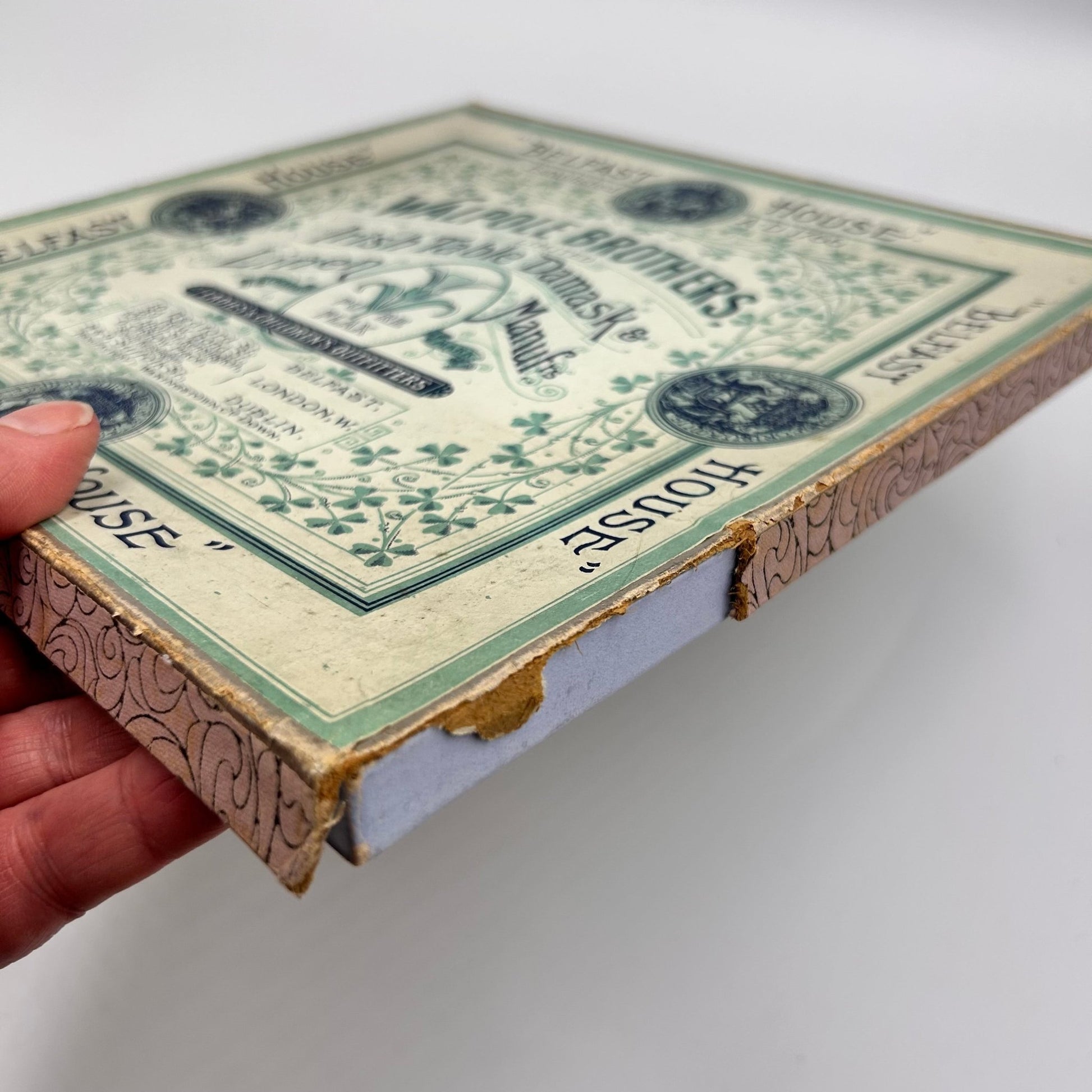 Antique Walpole brothers Linen handkerchiefs box loss on one side held by hand - Splendid Vintage World