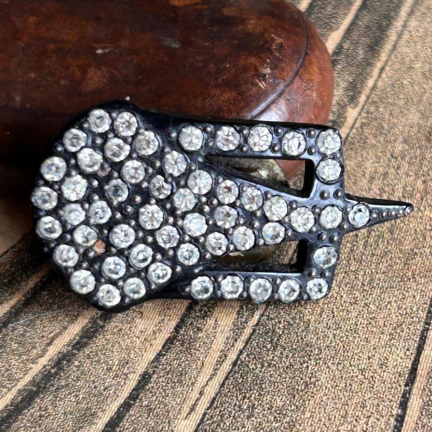 Art Deco 1930s dress clip or brooch of black glass & clear diamante’ set against an old illustration - Splendid Vintage World