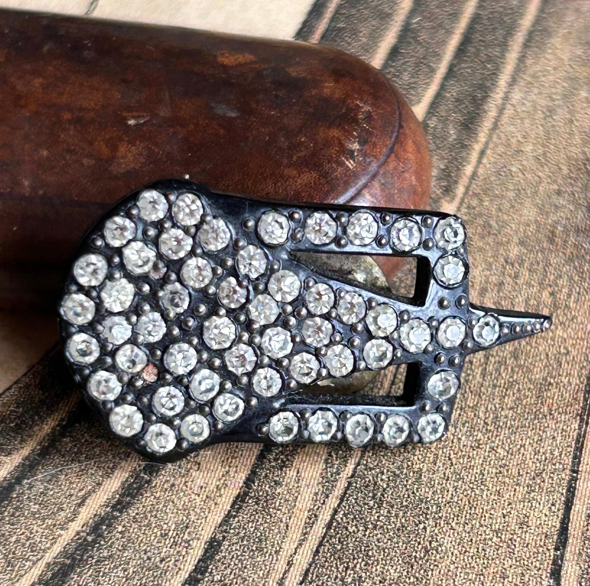 Art Deco 1930s dress clip or brooch of black glass & clear diamante’ against an old illustration- Splendid Vintage World