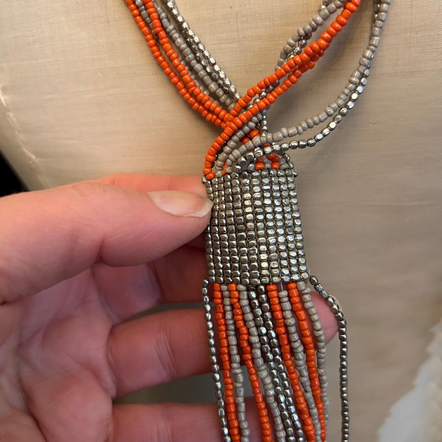 Art Deco Sautoir Necklace: Silver Metal , grey & Orange Glass Beads and fringed bead ends