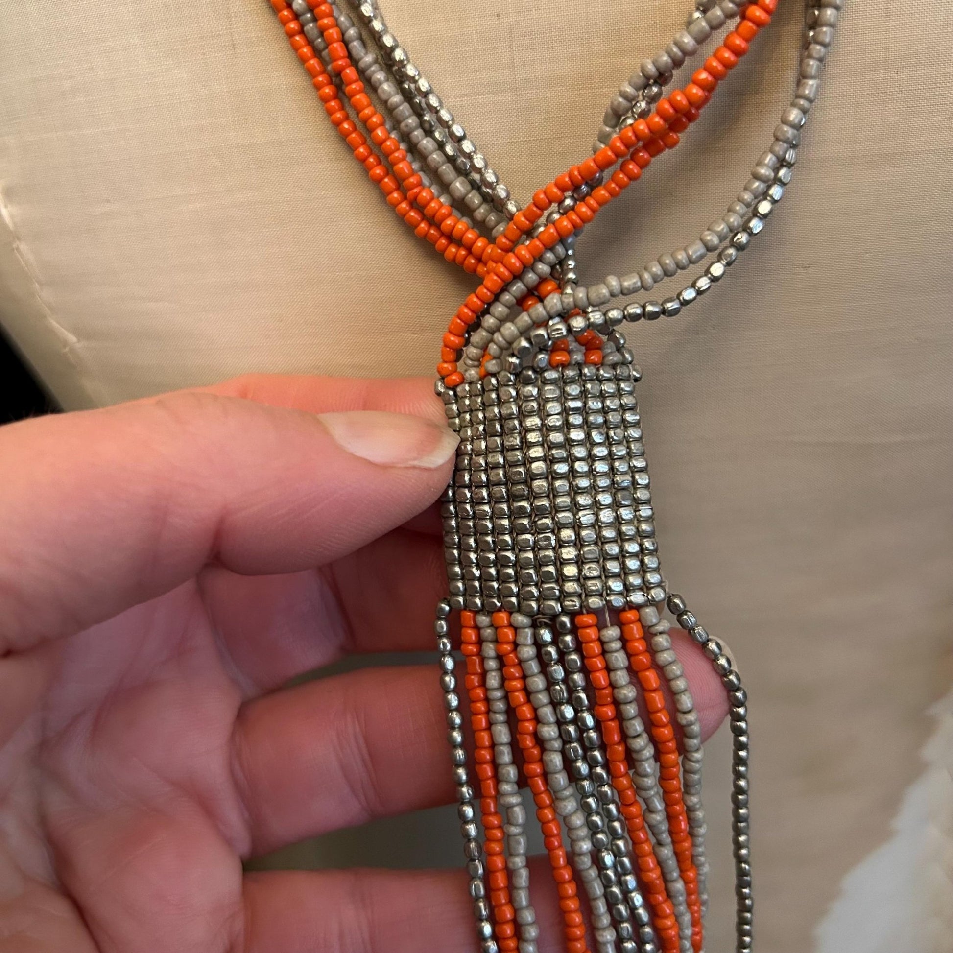 Art Deco Sautoir Necklace: Silver Metal , grey & Orange Glass Beads and fringed bead ends