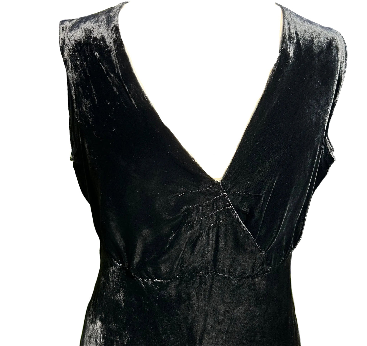 Vintage 1930s black velvet sleeveless bodice of dress against white background - Splendid Vintage World
