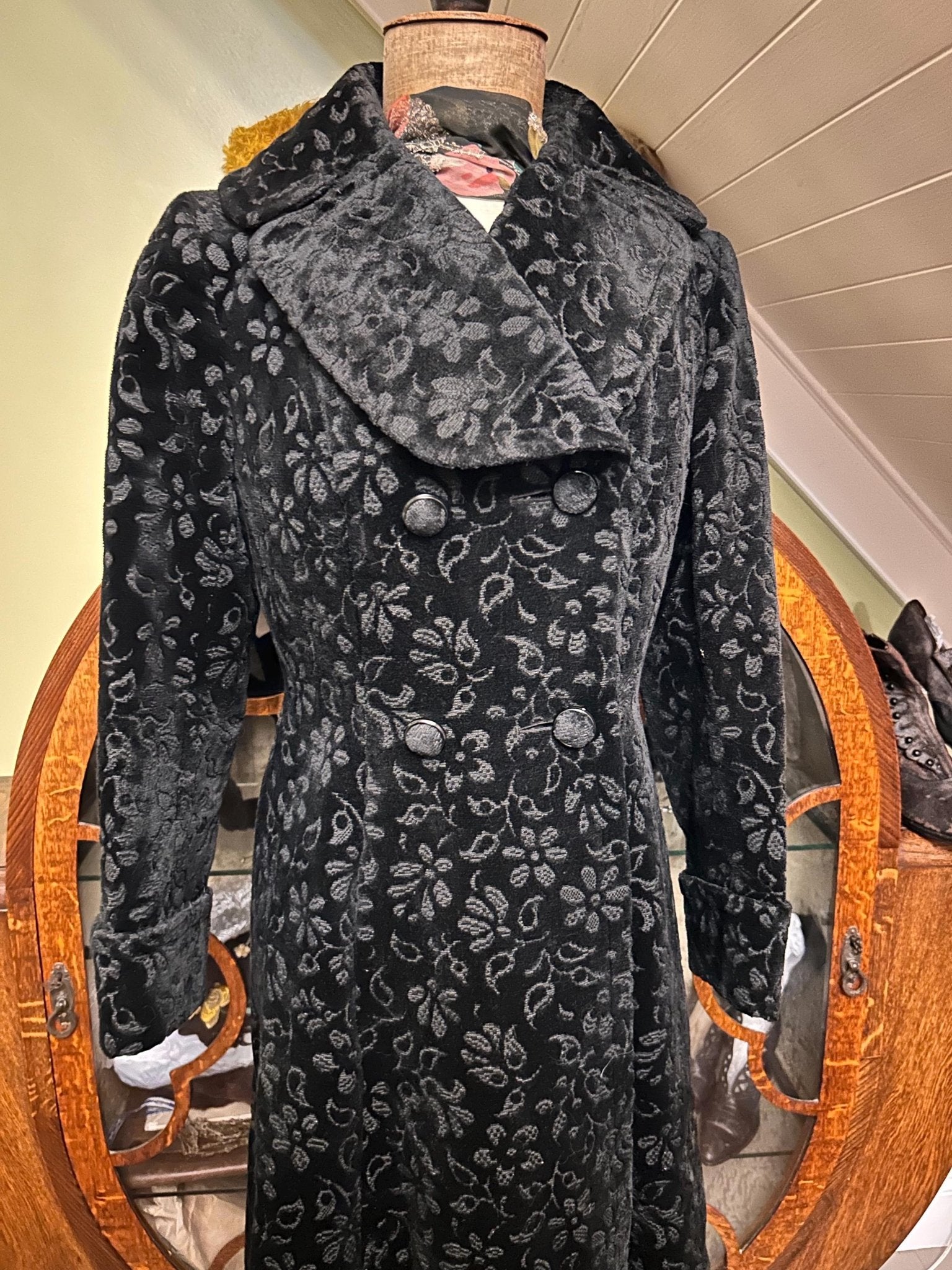 Vintage long black floral velvet coat double breasted fit victorian Edwardian style in room setting - Splendid Vintage World