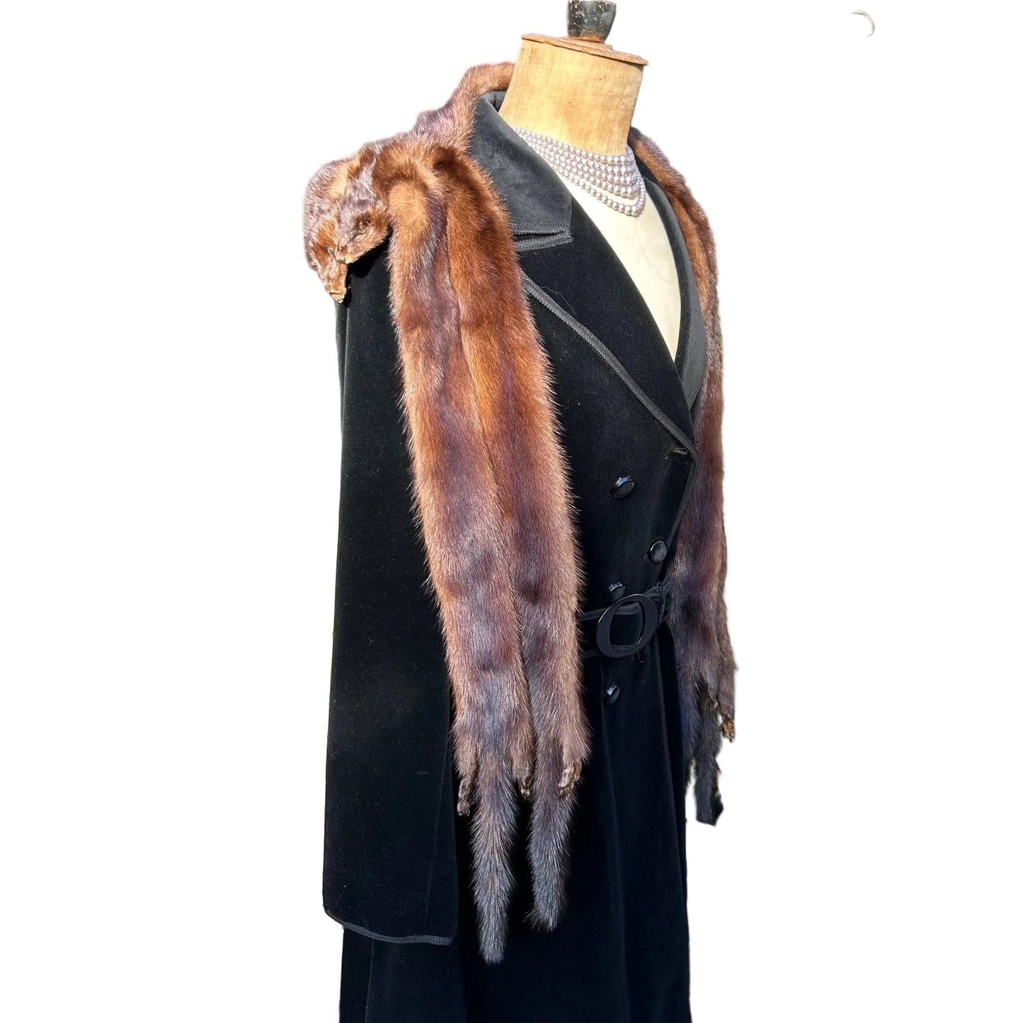 Vintage mink fur stole tippet draped over a black coat on a mannequin on white background - Splendid Vintage World