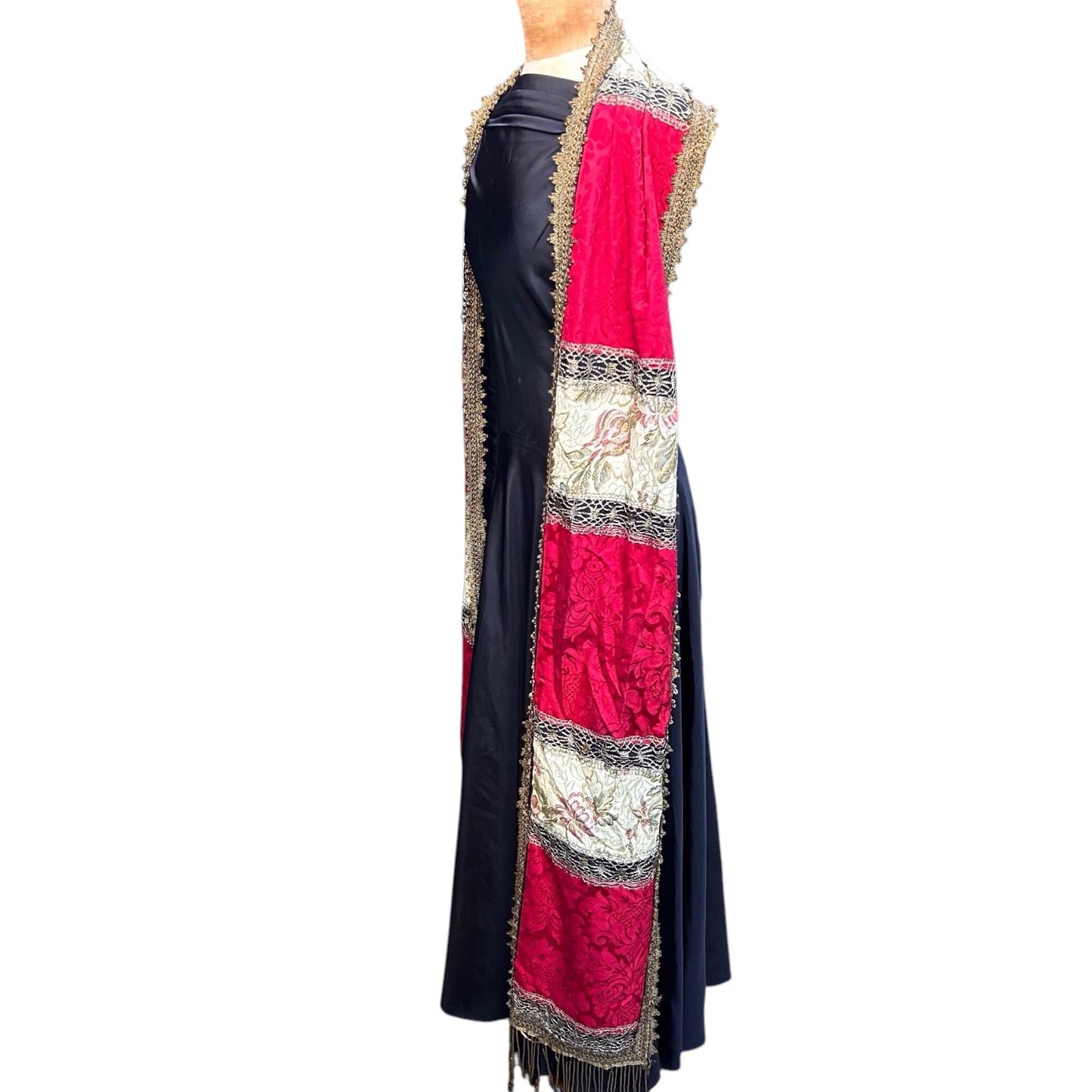 Long wide red, gold & cream panel fabric Scarf over black dress on a mannequin on white backdrop - Splendid Vintage World